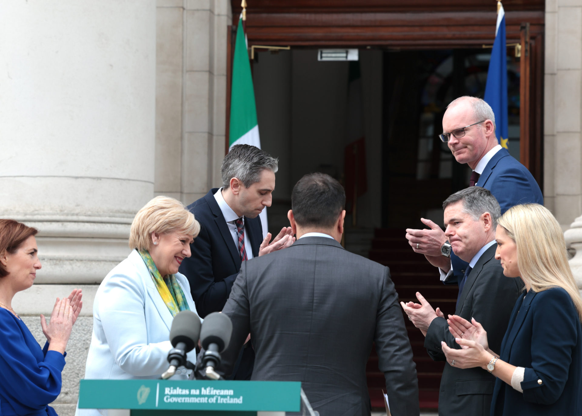 Leo Varadkar is applauded off the podium by his Fine Gael colleagues after announcing his resignation outside Leinster House