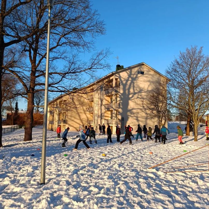 Students outside the Viertola school near Helsinki, Finland, 2-2-24. 