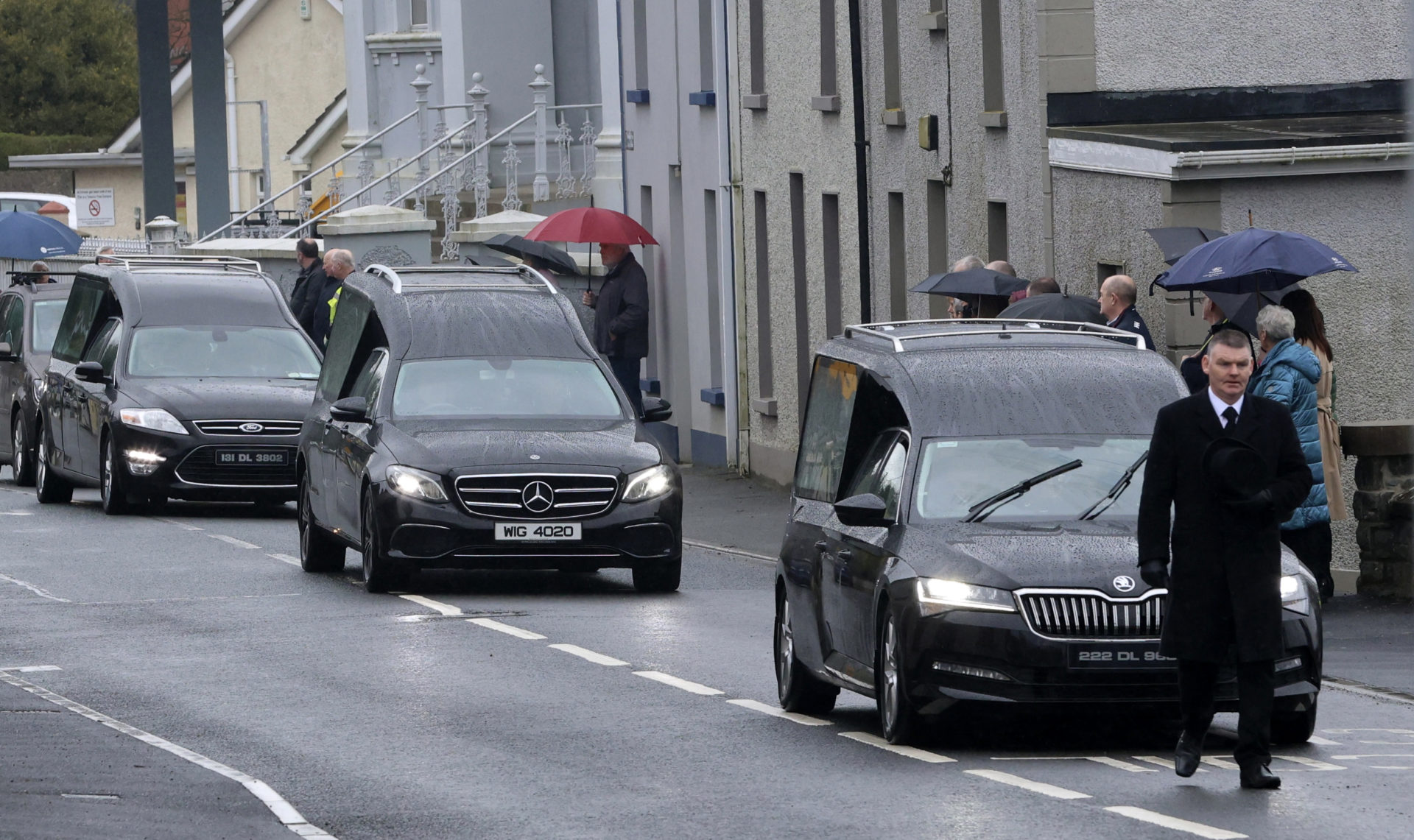 Hearses arrive St Eunan's Church in Raphoe, Co Donegal for the funeral of Una, Ciara and Saoirse Bowden, 3-4-24. 