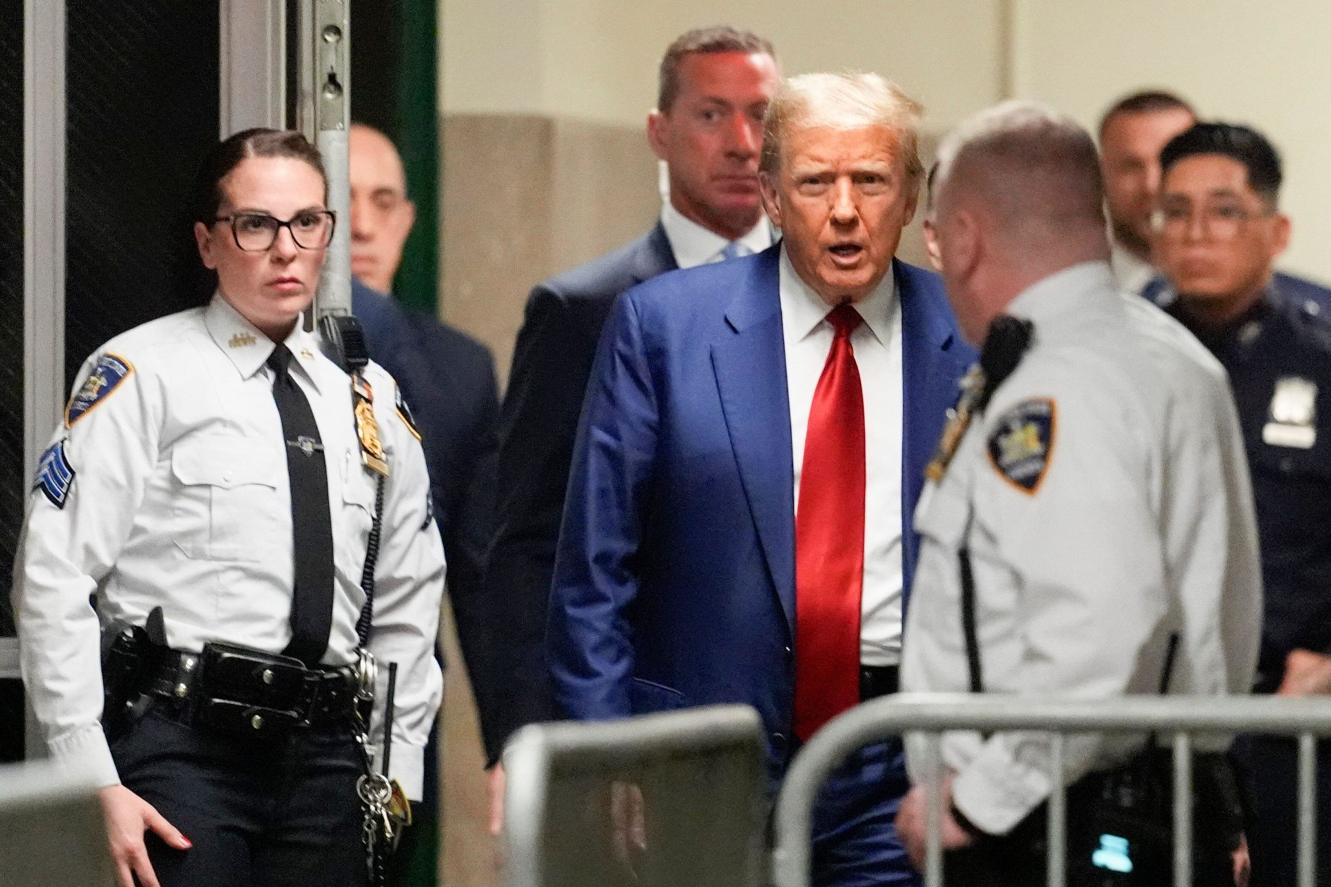 Former US President Donald Trump arrives in Manhattan criminal court to attend a pre-trial hearing, 