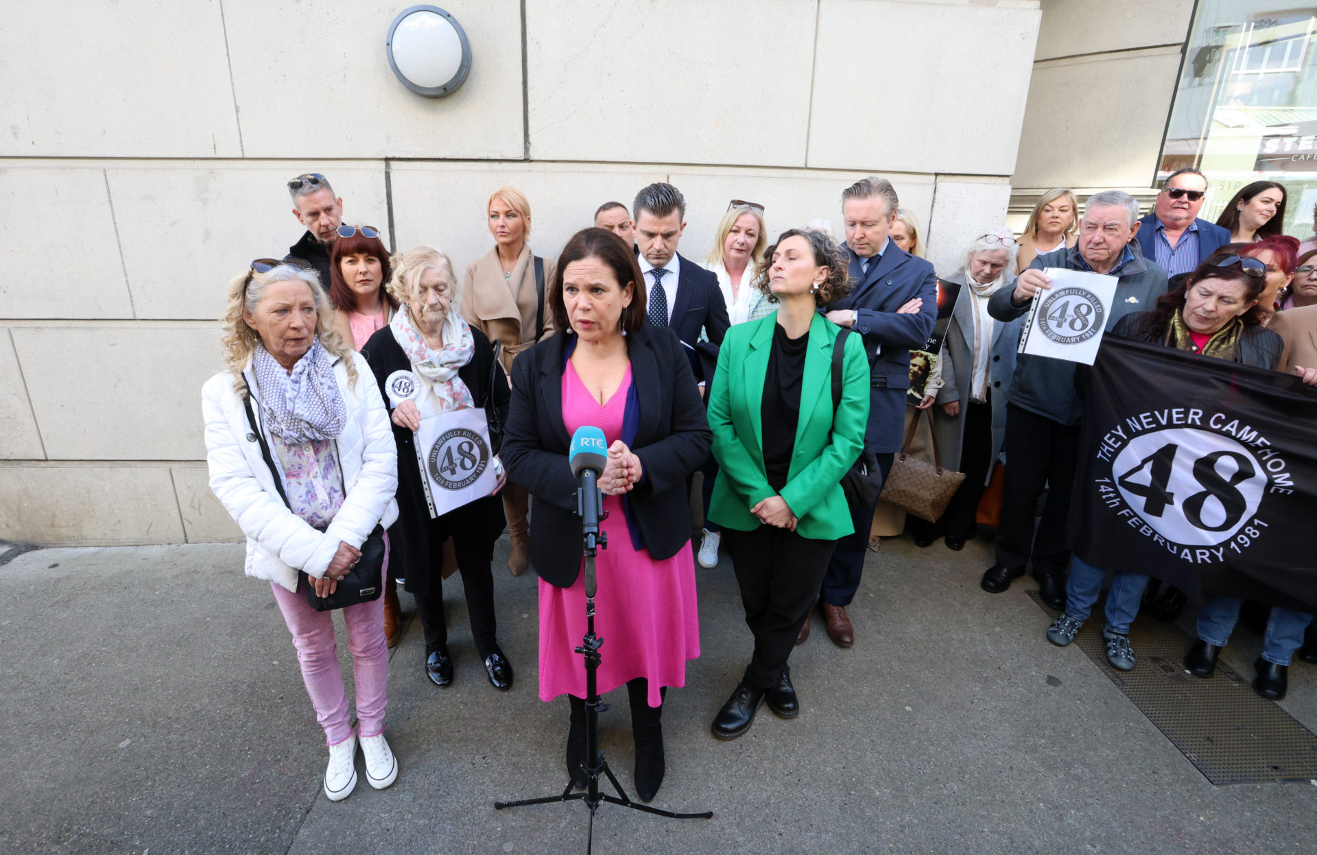Mary Lou McDonald with Stardust victims' family members outside Government Buildings. Image: Sasko Lazarov/© RollingNews.ie