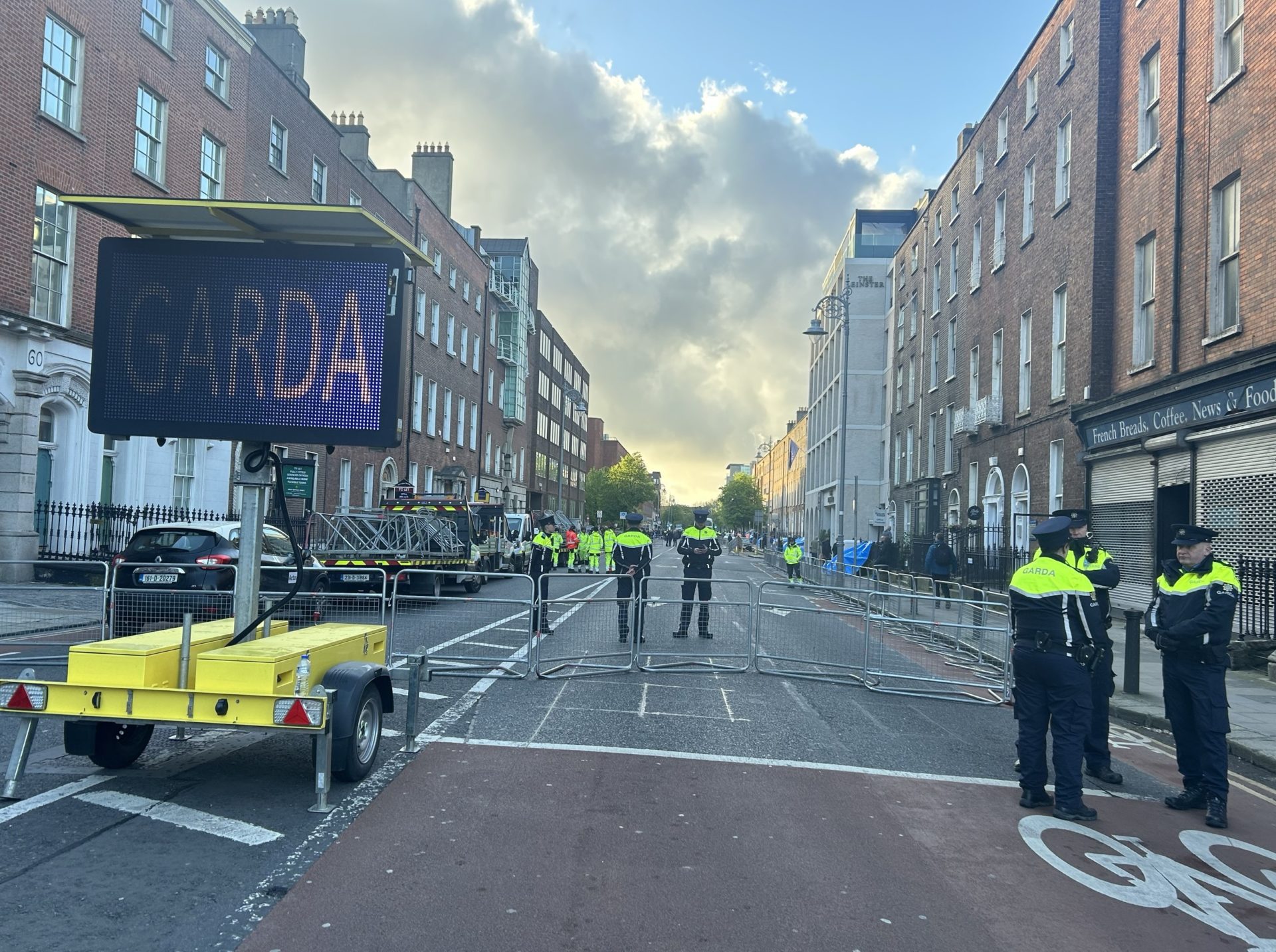 Gardaí stand on Dublin's Mount Street during an operation to remove asylum seeker tents outside the International Protection Office, 1-5-24.