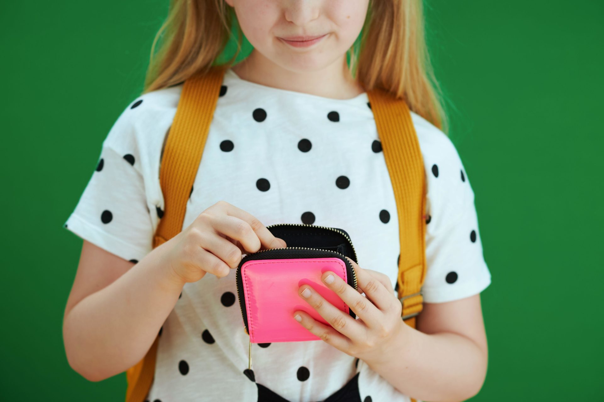 Child counting pocket money