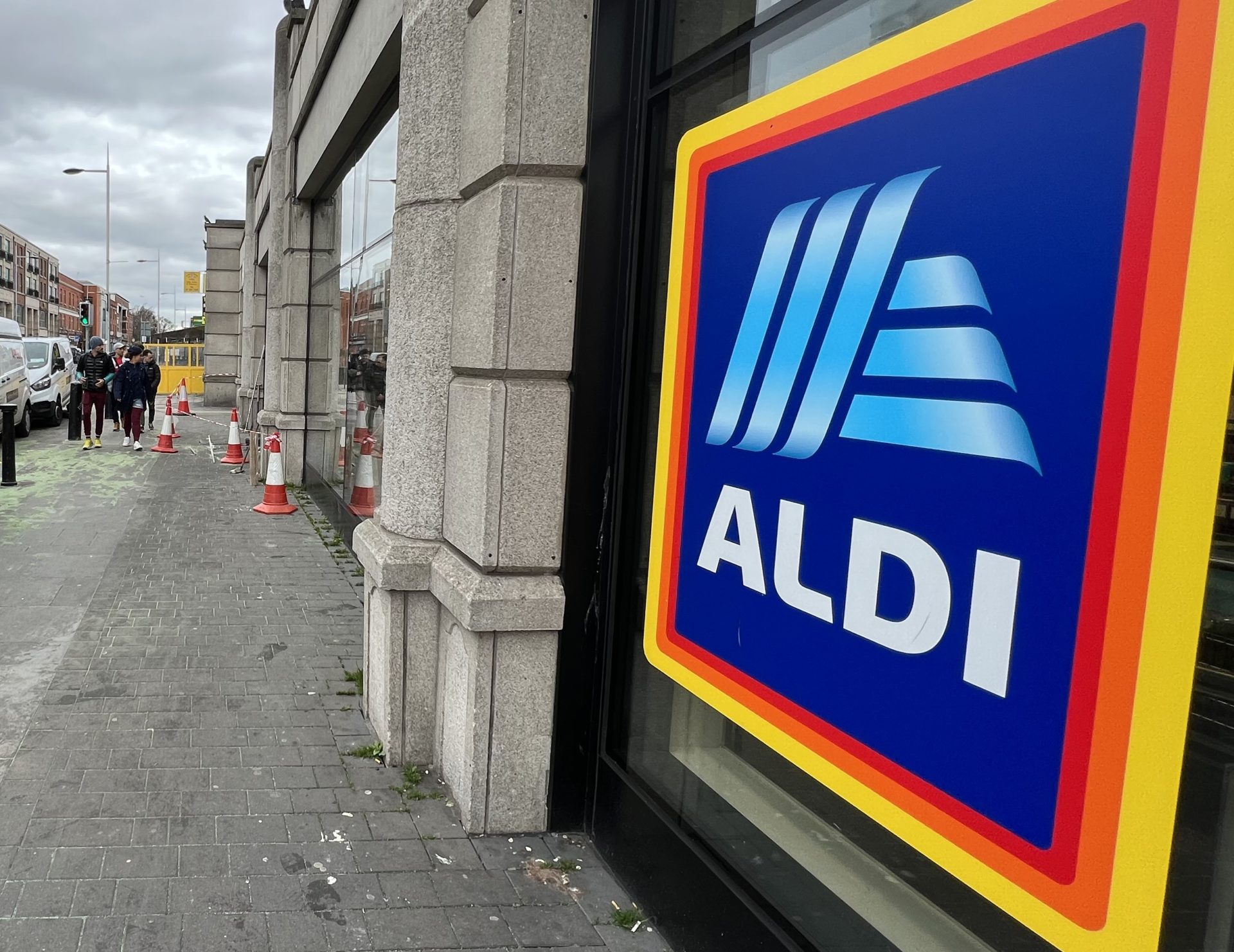 An Aldi sign next to a supermarket in Rathmines in Dublin, 20-3-23