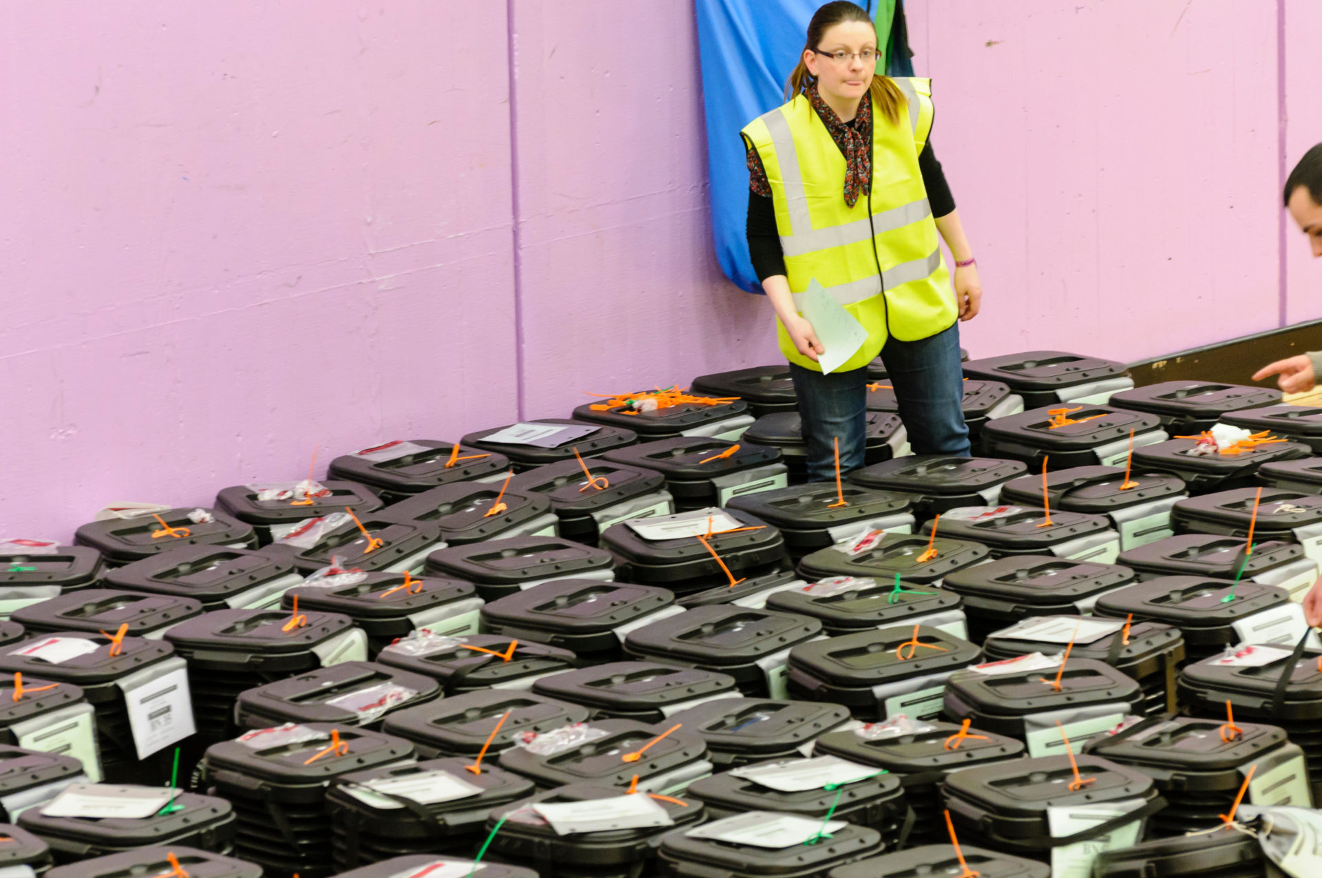 Ballot boxes are collected at a counting centre. Alamy.com