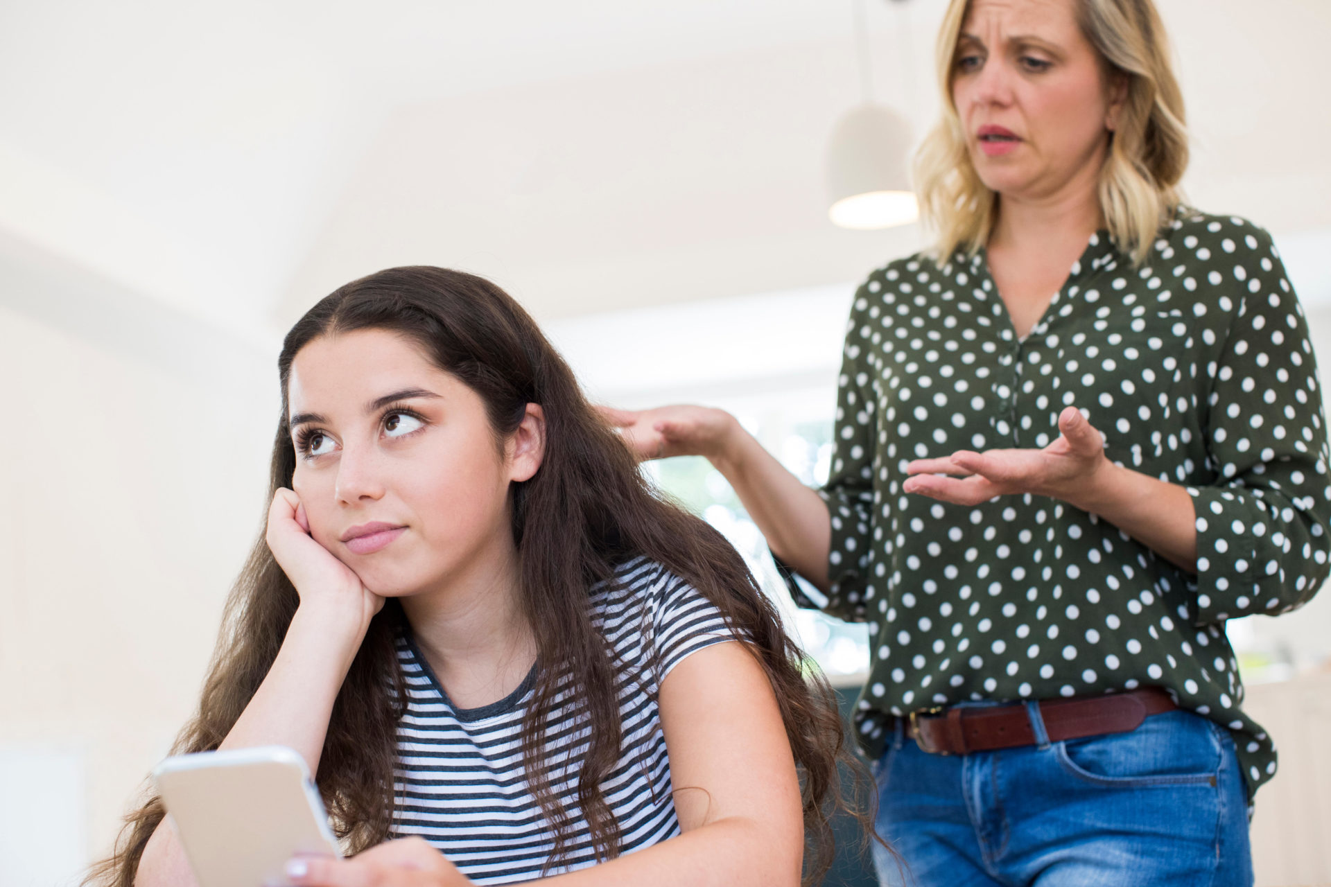 Mother arguing with teenagers. Image: Daisy-Daisy / Alamy Stock Photo