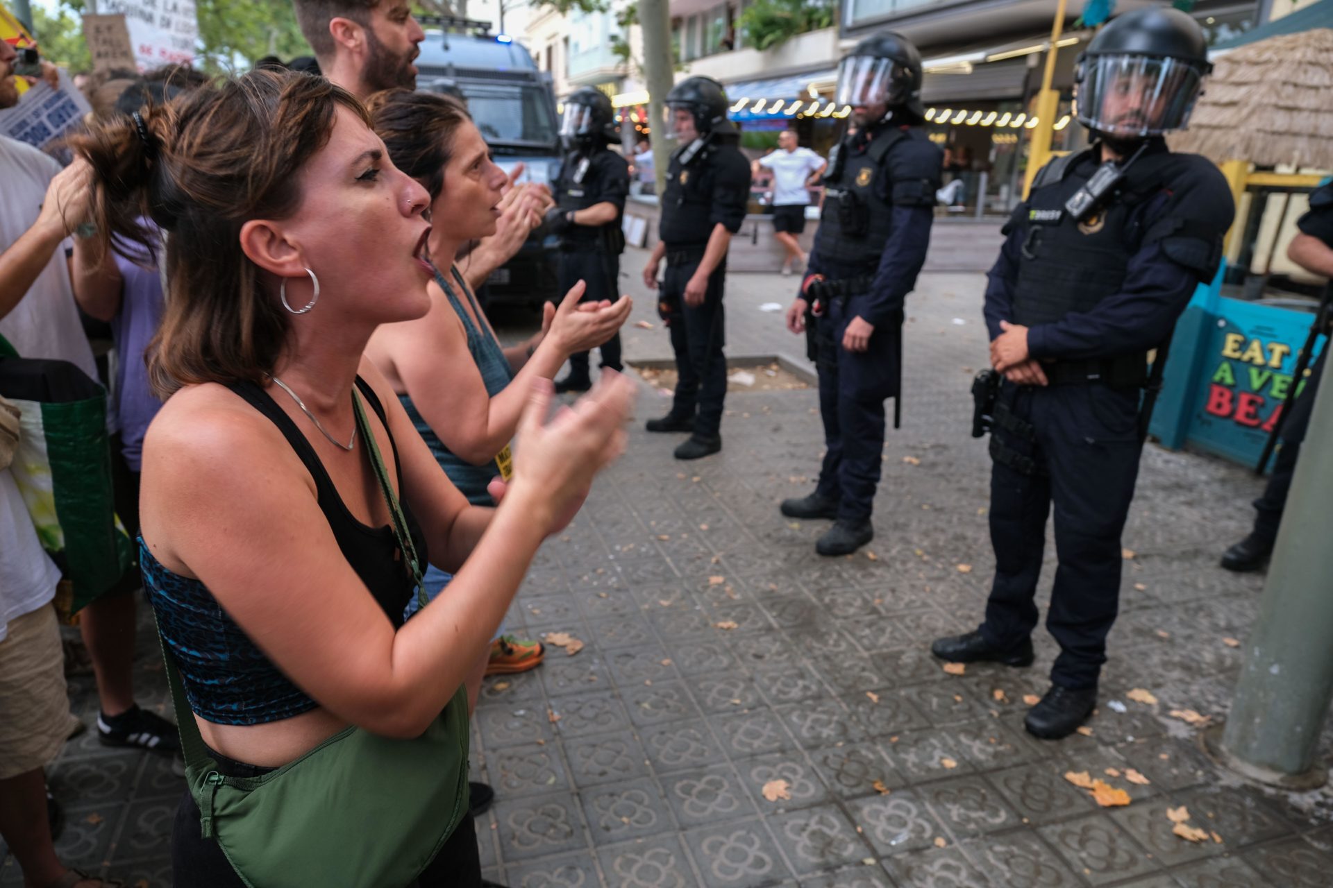 Anti-tourism protesters in Barcelona use water suns on diners