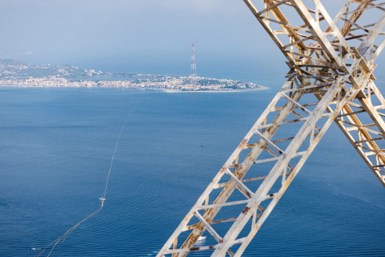 The slackline was spanned between two old power pylons.