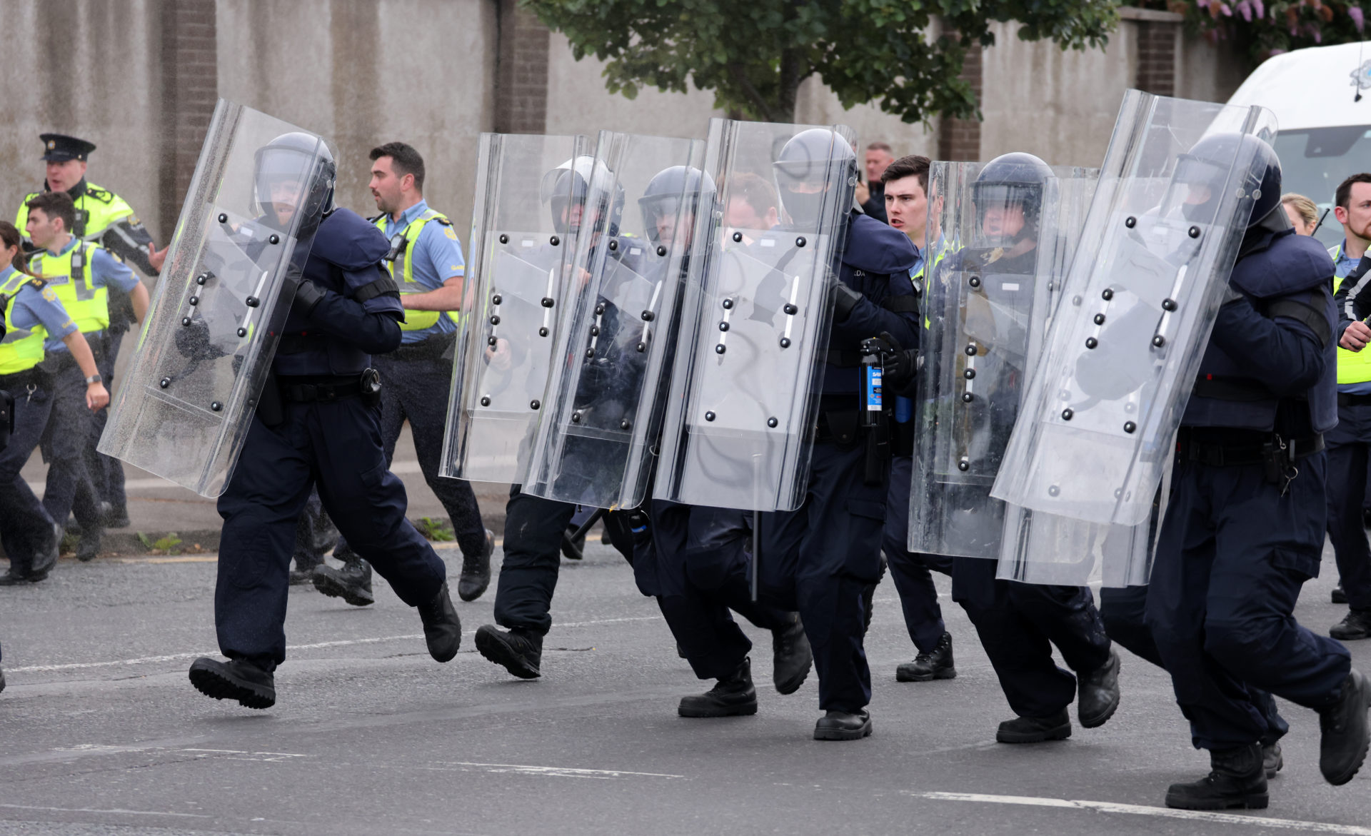 Members of the Garda Public Order Unit near the site of the former Crown Paints factory in Coolock, north Dublin, 15-7-24.