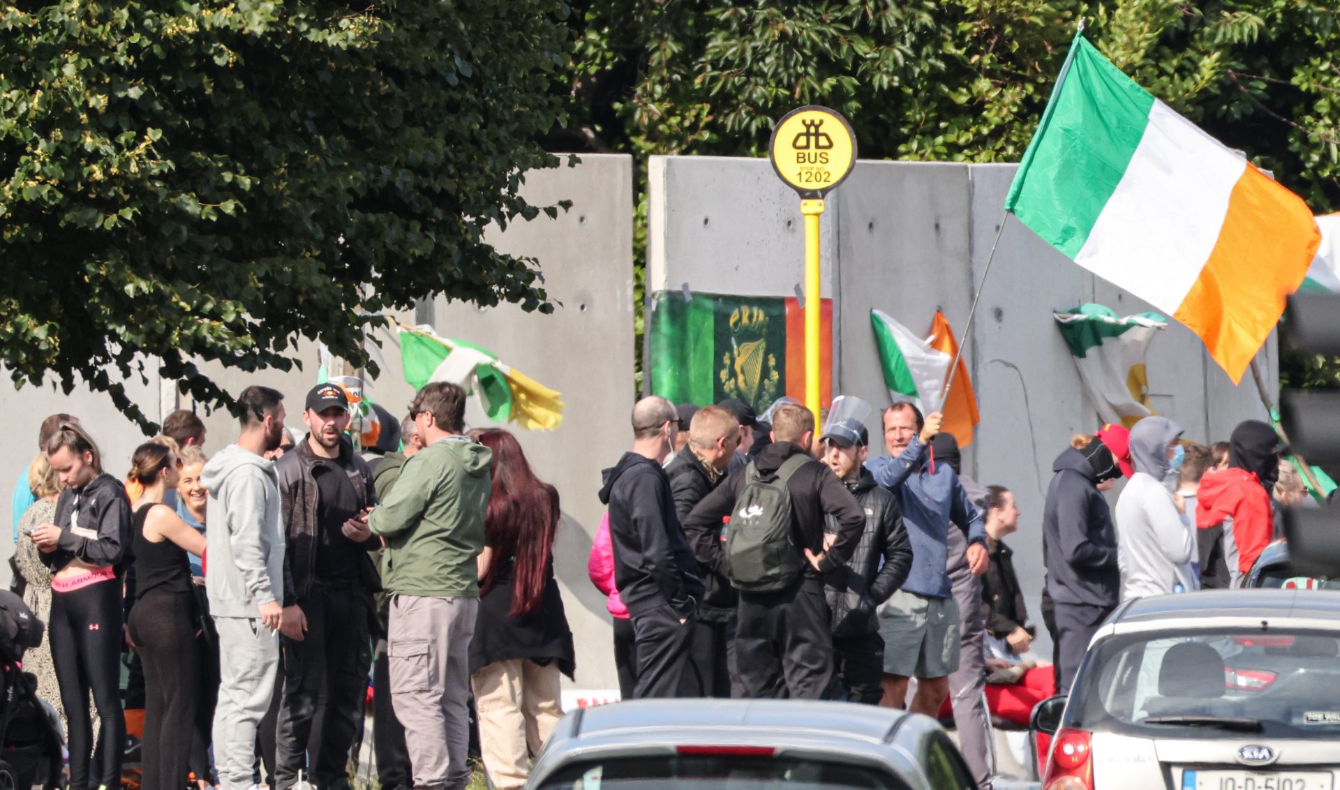 A crowd has gathered again today at the site of the former Crowne Paints factory in Coolock, County Dublin.