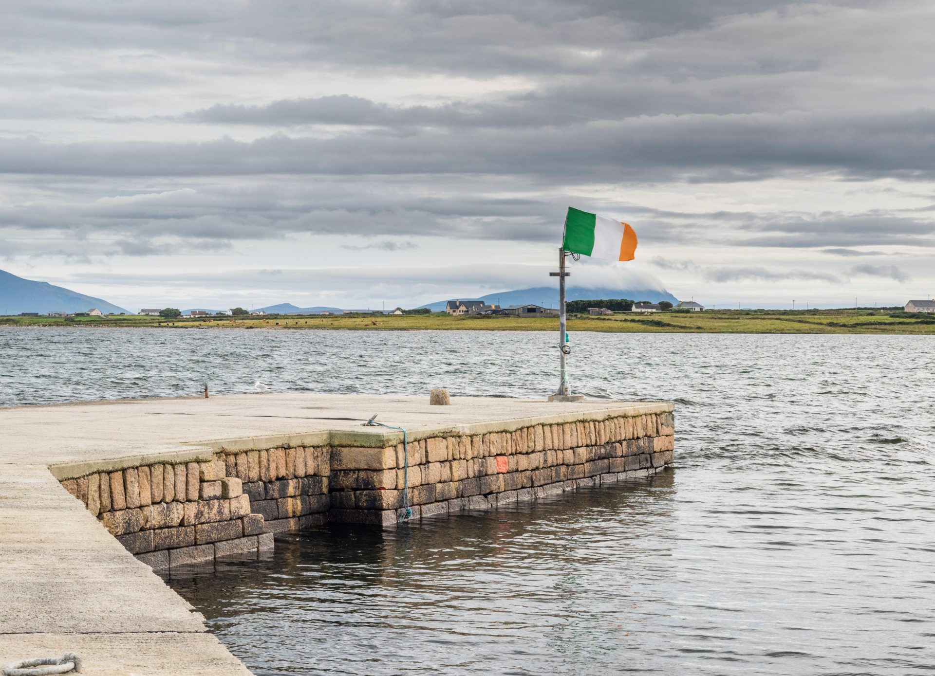 The pier in the town of Belmullet, Co Mayo flying the Irish Tricolour, 10-8-17.