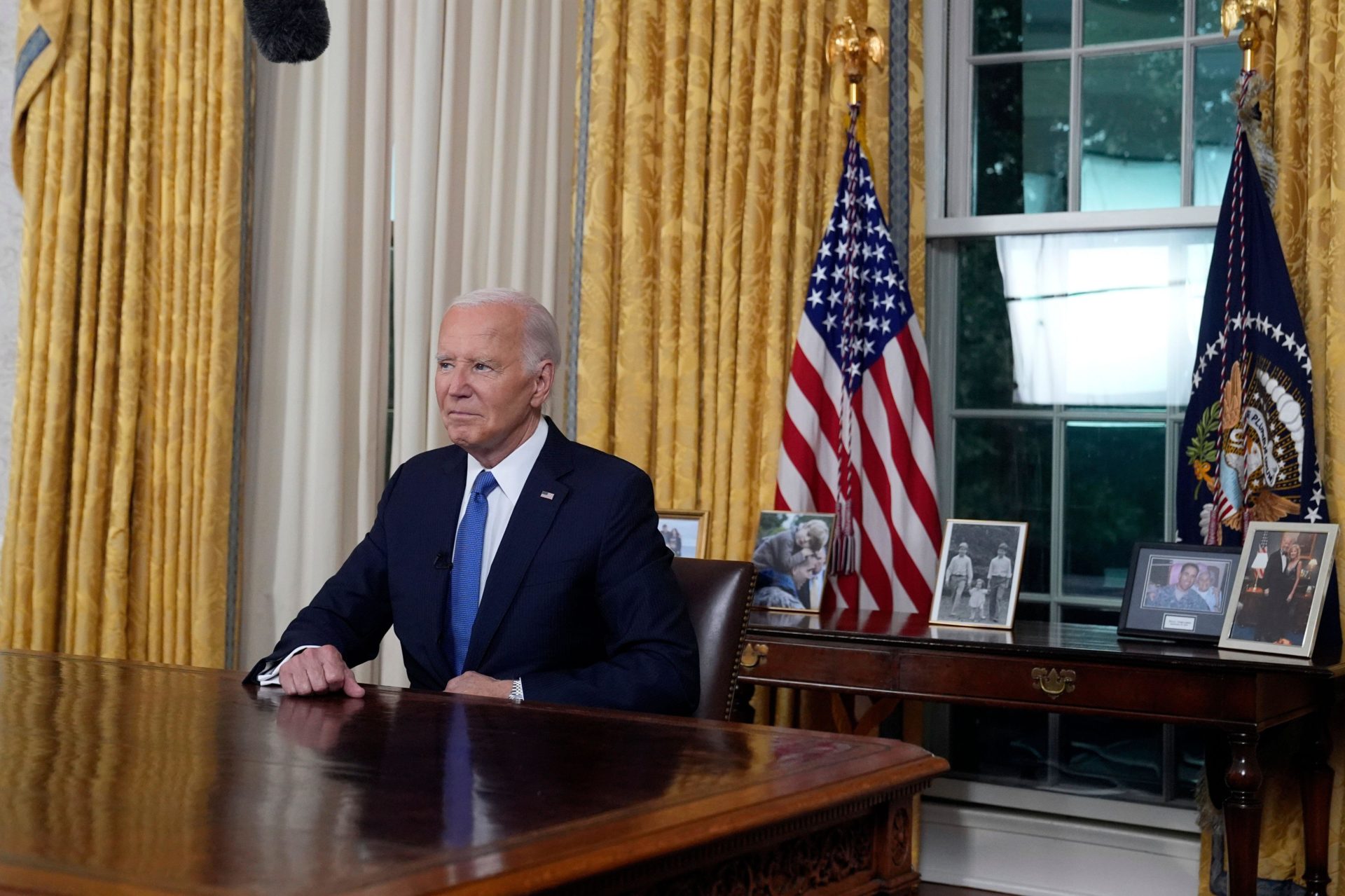 US President Joe Biden pauses as he concludes his address to the nation from the Oval Office of the White House in Washington DC, 24-7-24