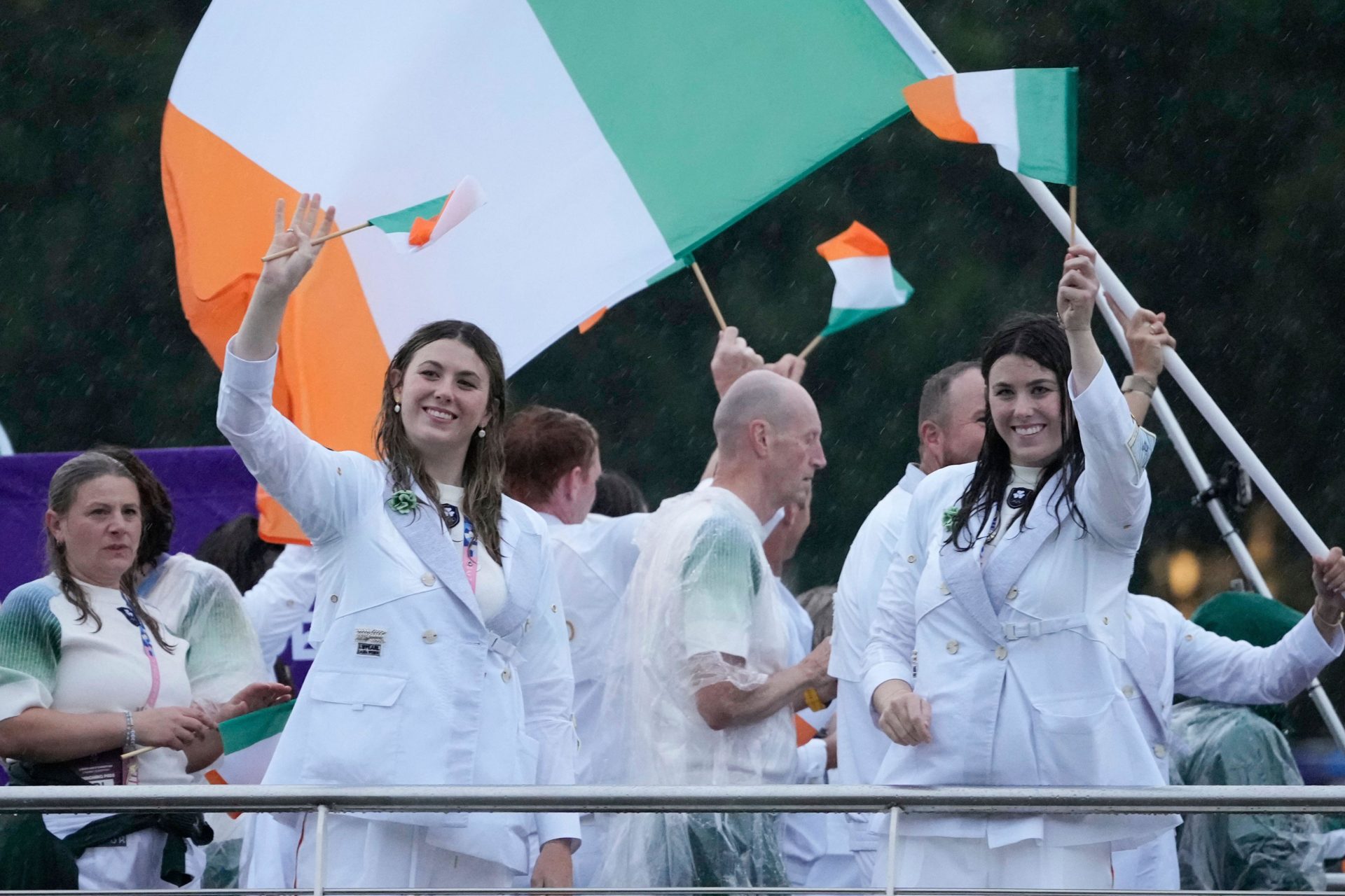 Ireland's team moves down the Seine River in Paris, France, during the opening ceremony of the 2024 Summer Olympics, Friday, July 26, 2024. (AP Photo/Morry Gash, Pool)