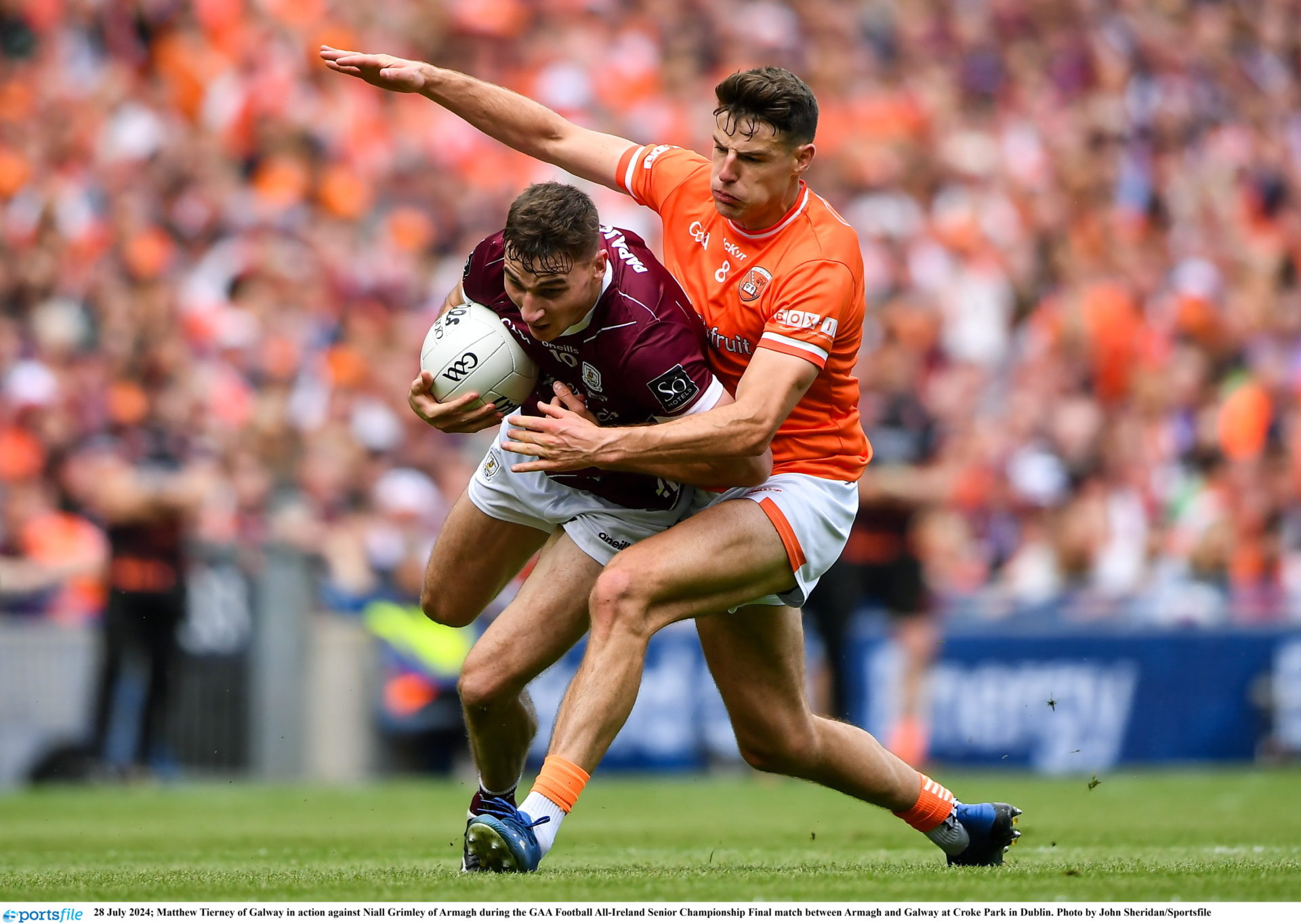 Matthew Tierney of Galway in action against Niall Grimley of Armagh during the GAA Football All-Ireland Senior Championship Final. Photo by John Sheridan/Sportsfile