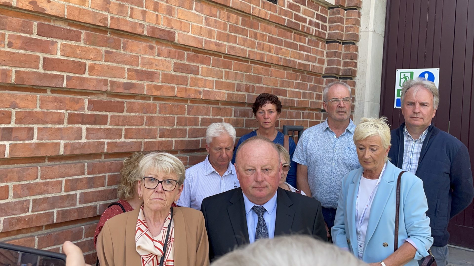 Matt O'Neill's parents Pat and Eileen speaking outside court flanked by family and friends in Cork, 31-7-24