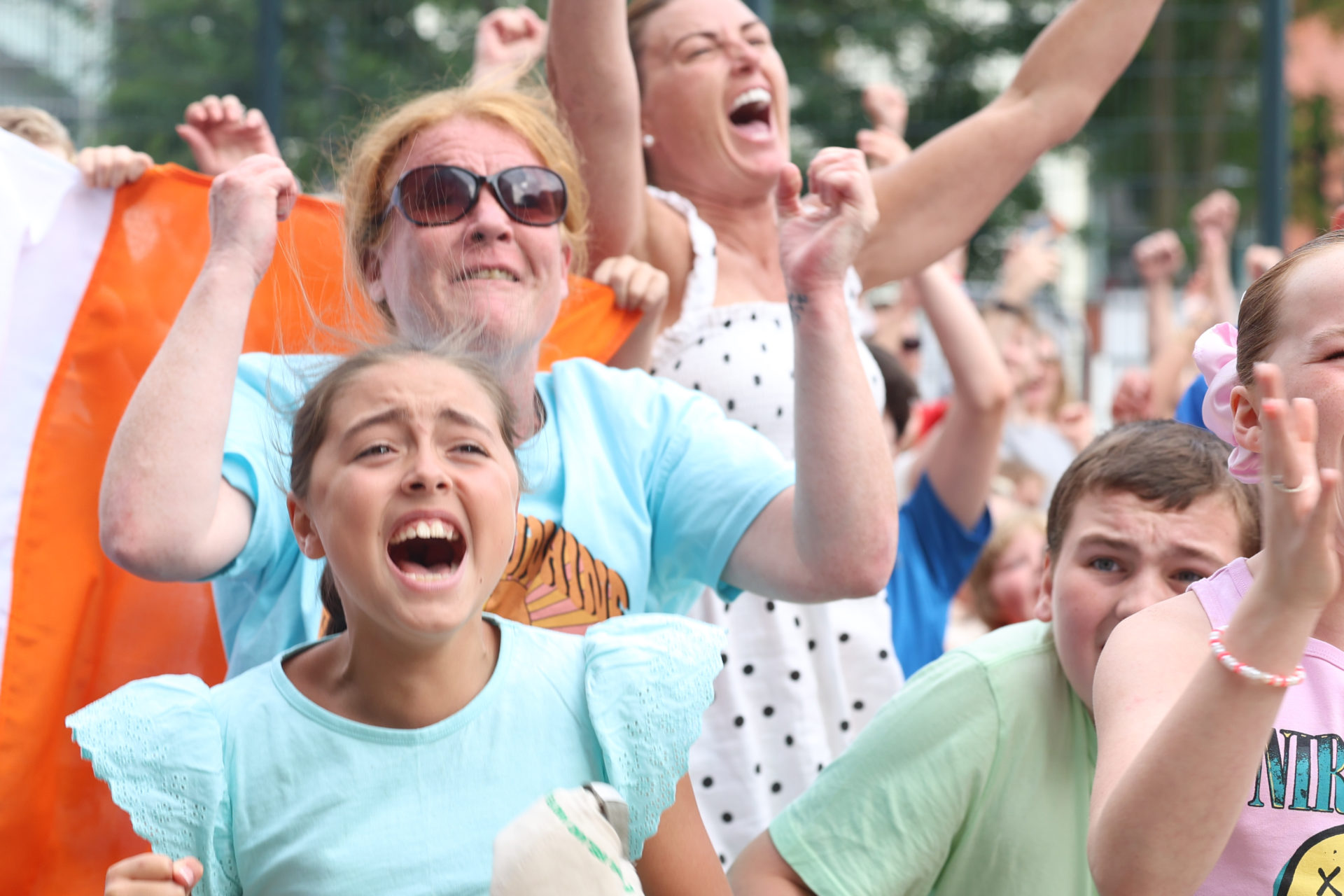 People react to a screening of Kellie Harrington's Olympic quarter-final fight in Dublin city, 31-7-24