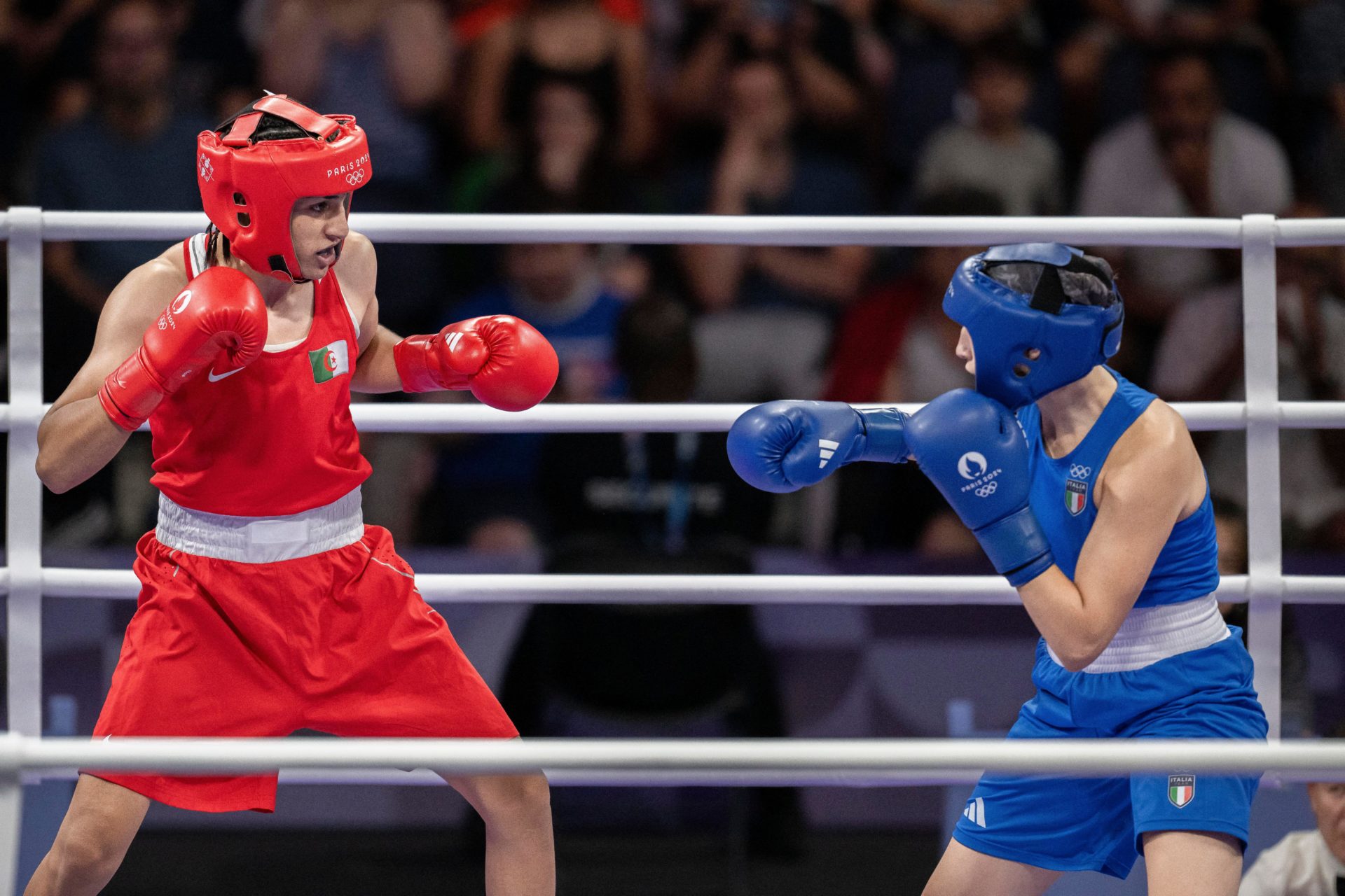 Imane Khelif and Angela Carini competing in Olympic boxing. Image: Abaca Press / Alamy Stock Photo 