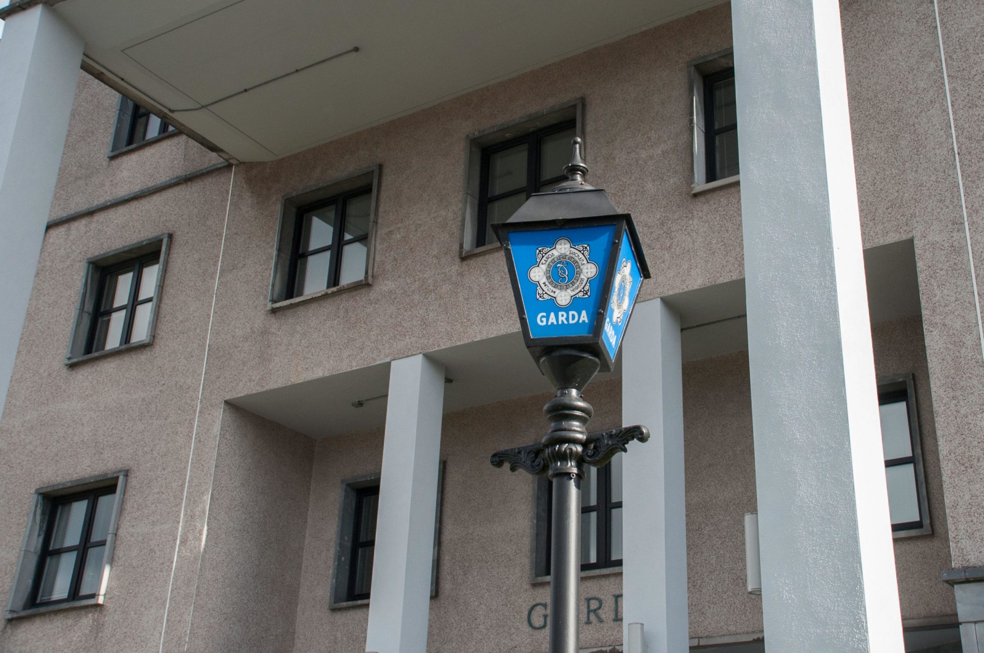 A Garda lamp sign outside a Cork city Garda Station.