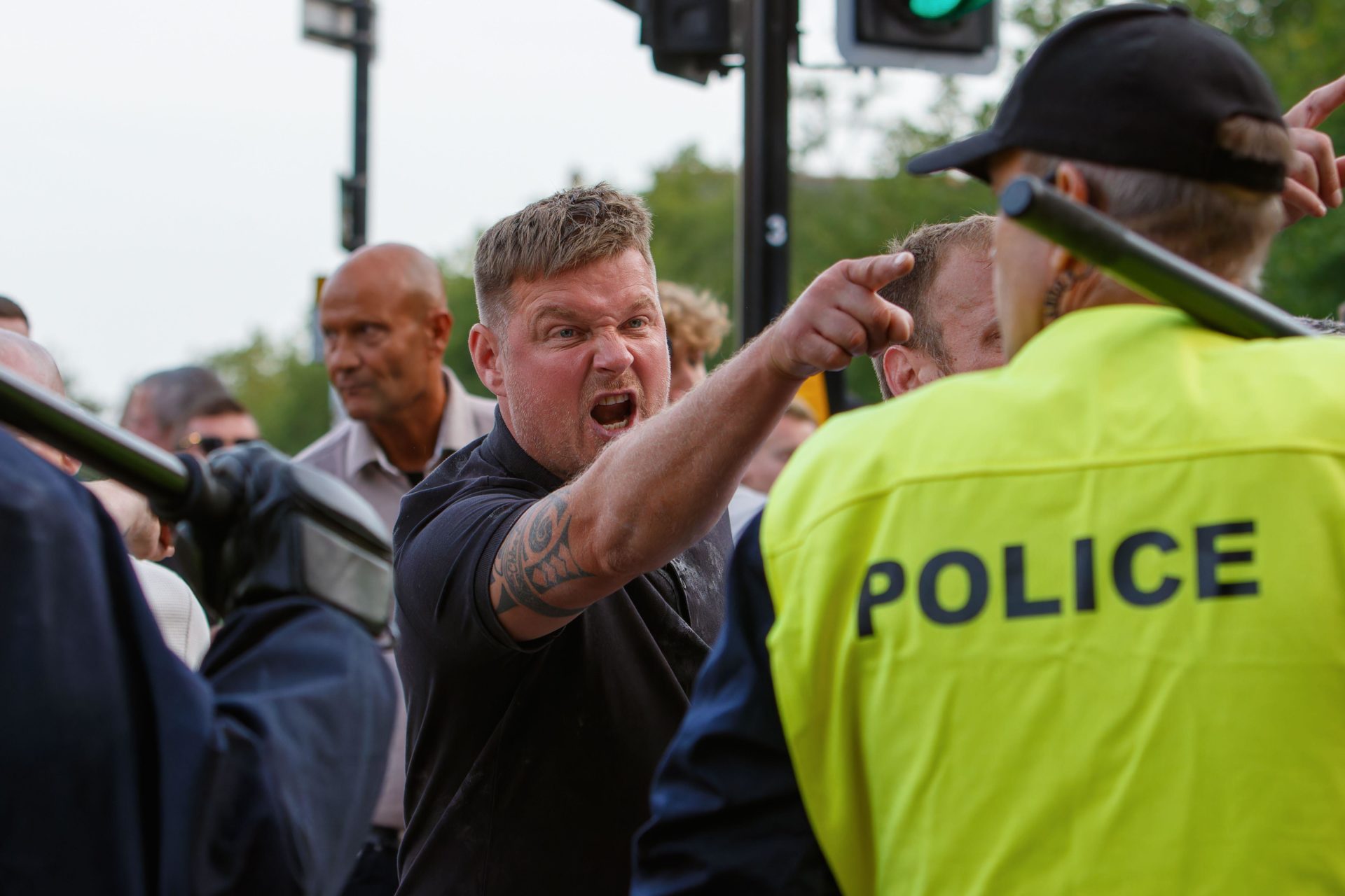 UK police are confronted by far-right activists during an 'Enough is Enough' protest near in Bristol, 3-8-24