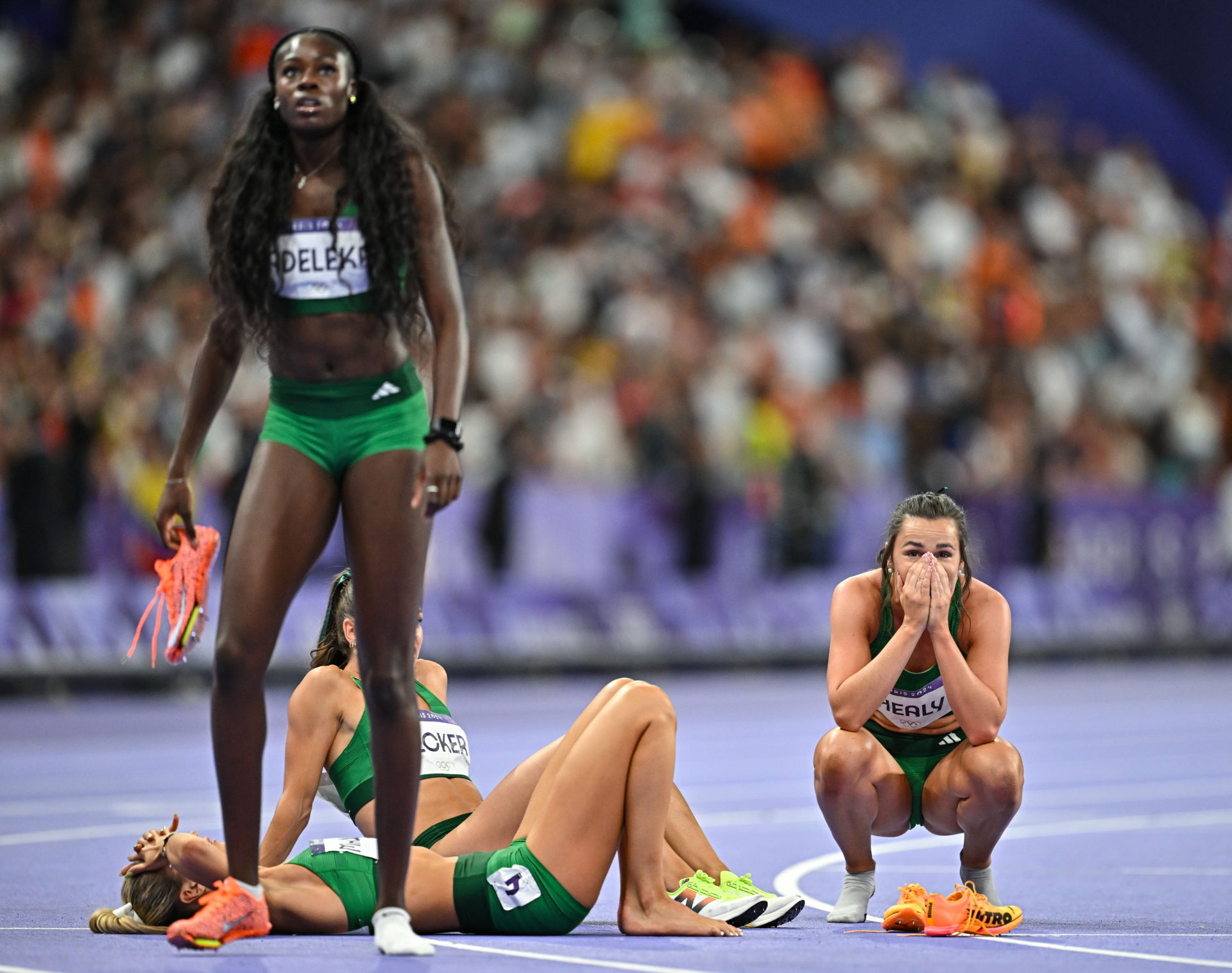 Rhasidat Adeleke, Sharlene Mawdsley, Sophie Becker and Phil Healy following the women's 4x400 relay final at the Stade de France during the 2024 Paris Summer Olympic Games in Paris, France. Image: Sam Barnes/Sportsfile