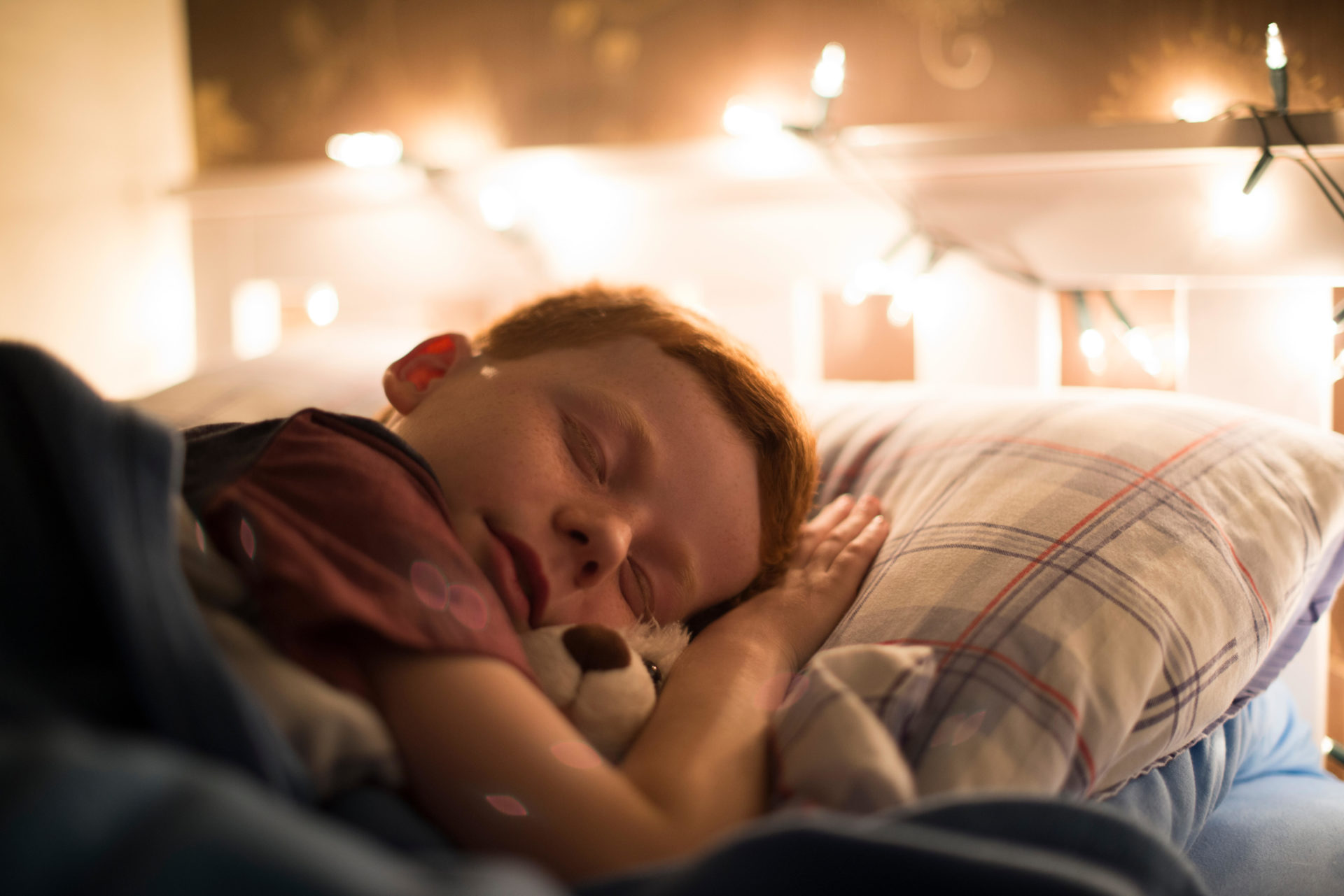 A child asleep in bed. Image: The Picture Pantry Ltd. t/a Park Lane Pictures / Alamy Stock Photo