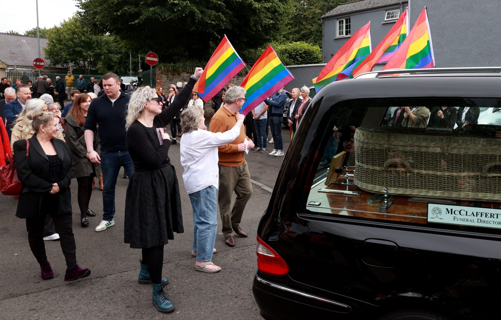 The family of Nell McCafferty follow the hearse carrying her coffin as she receives a guard of honour. Image: PA Images / Alamy Stock Photo 