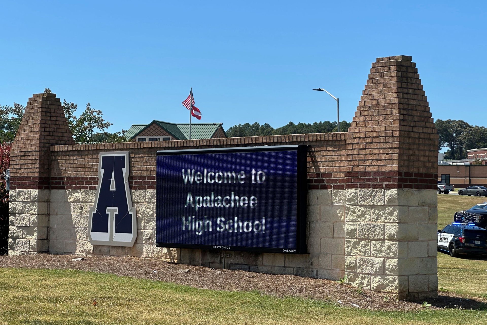 Law enforcement arrive as students are evacuated to the football stadium after Apalachee High School was placed on lockdown, 4-9-24.