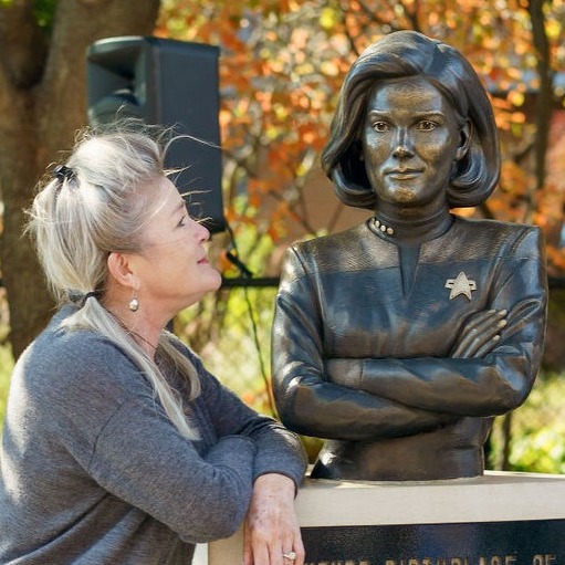 Actress Kate Mulgrew with a statue to her Captain Kathryn Janeway character in Bloomington, Indiana