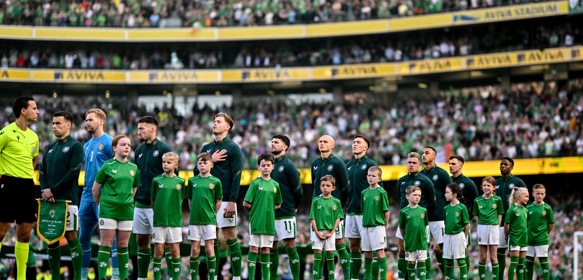 The Republic of Ireland team stand for Amhrán na bhFiann before a match against England at Aviva Stadium in Dublin, 7-9-24.