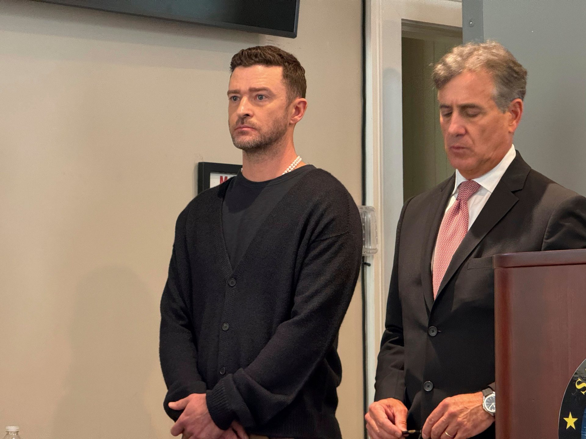 Justin Timberlake (left) appears in court with his attorney Edward Burke in New York, 13-9-24.