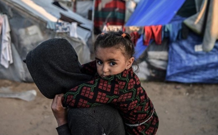 A girl living in a displacement shelter in Rafah, Southern Gaza in February 2024.