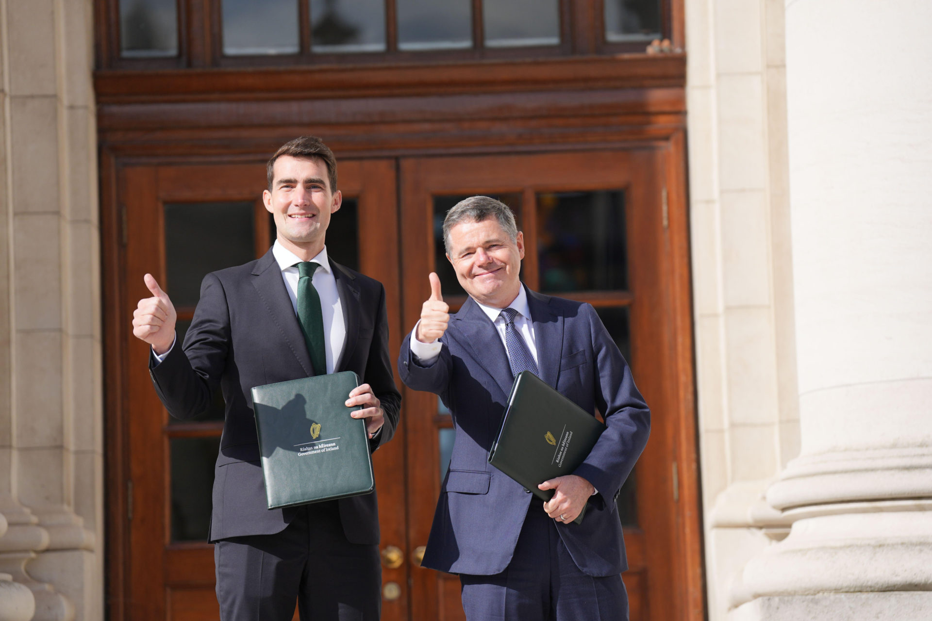 Minister’s Jack Chambers and Paschal Donohoe on the steps of Leinster House