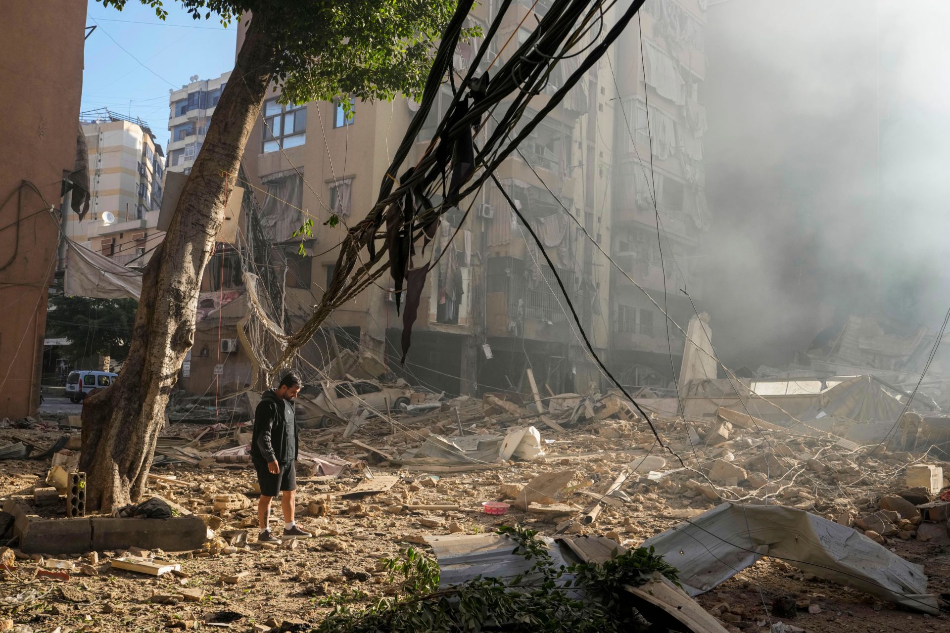 A man checks the damage to his home after an Israeli airstrike in Beirut, Lebanon.
