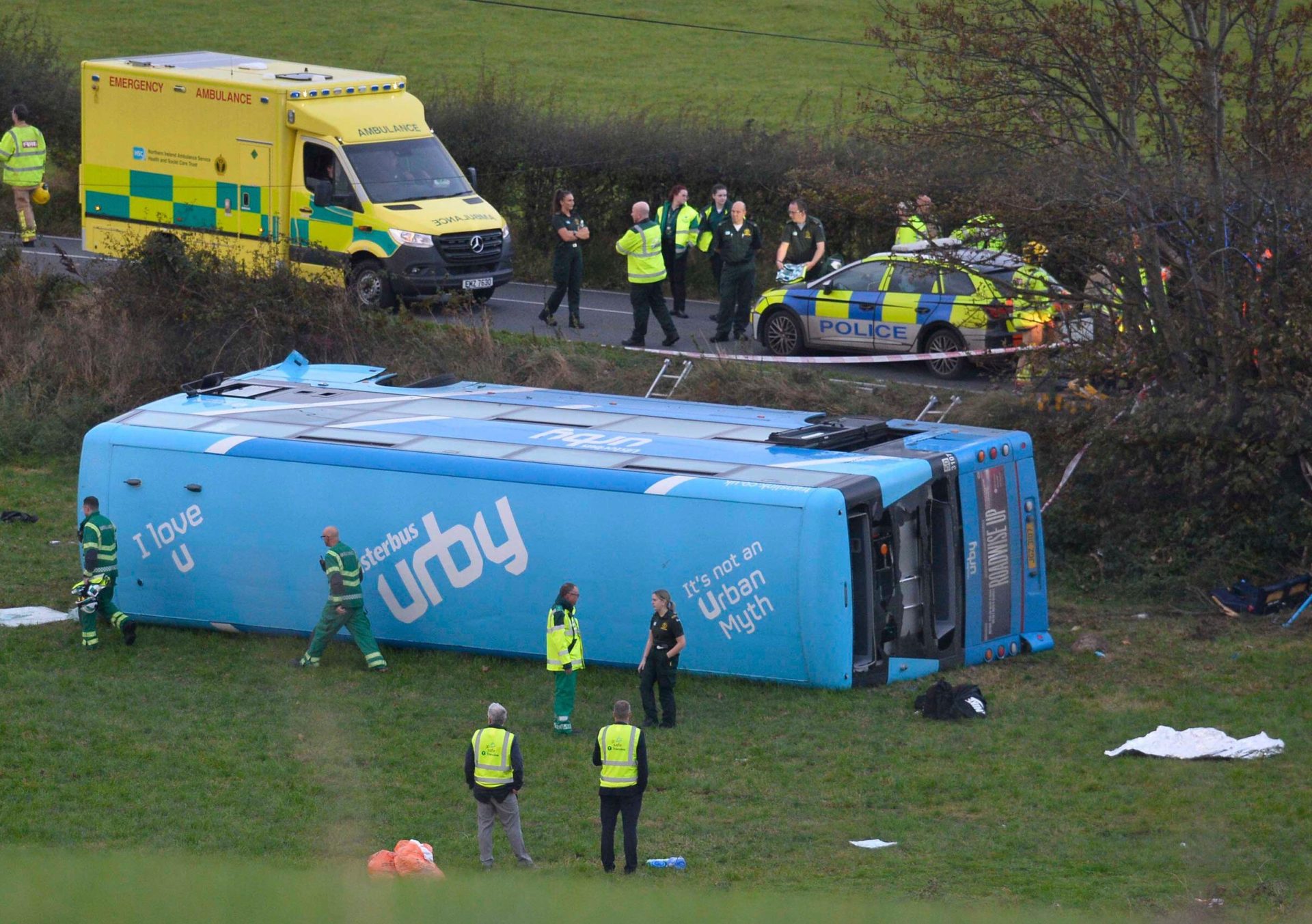 Emergency workers at the scene of a school bus crash on the Ballyblack Road East near Carrowdore in Co Down, 7-10-24.