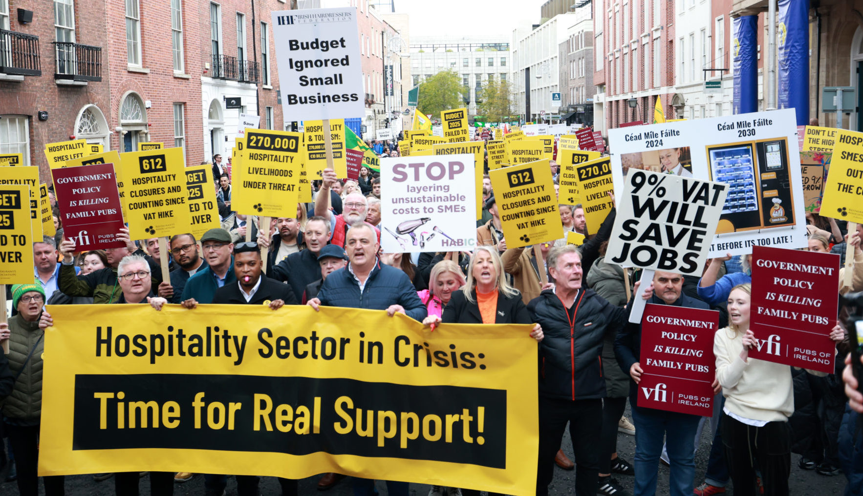 Crowds of workers and staff along with business owners from the hospitality, tourism, retail and other sectors taking part in a protest towards Leinster House, 15-10-24.