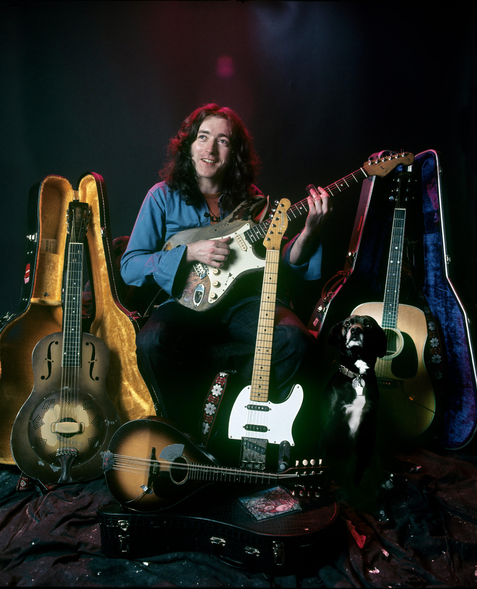 Rory Gallagher with his guitars