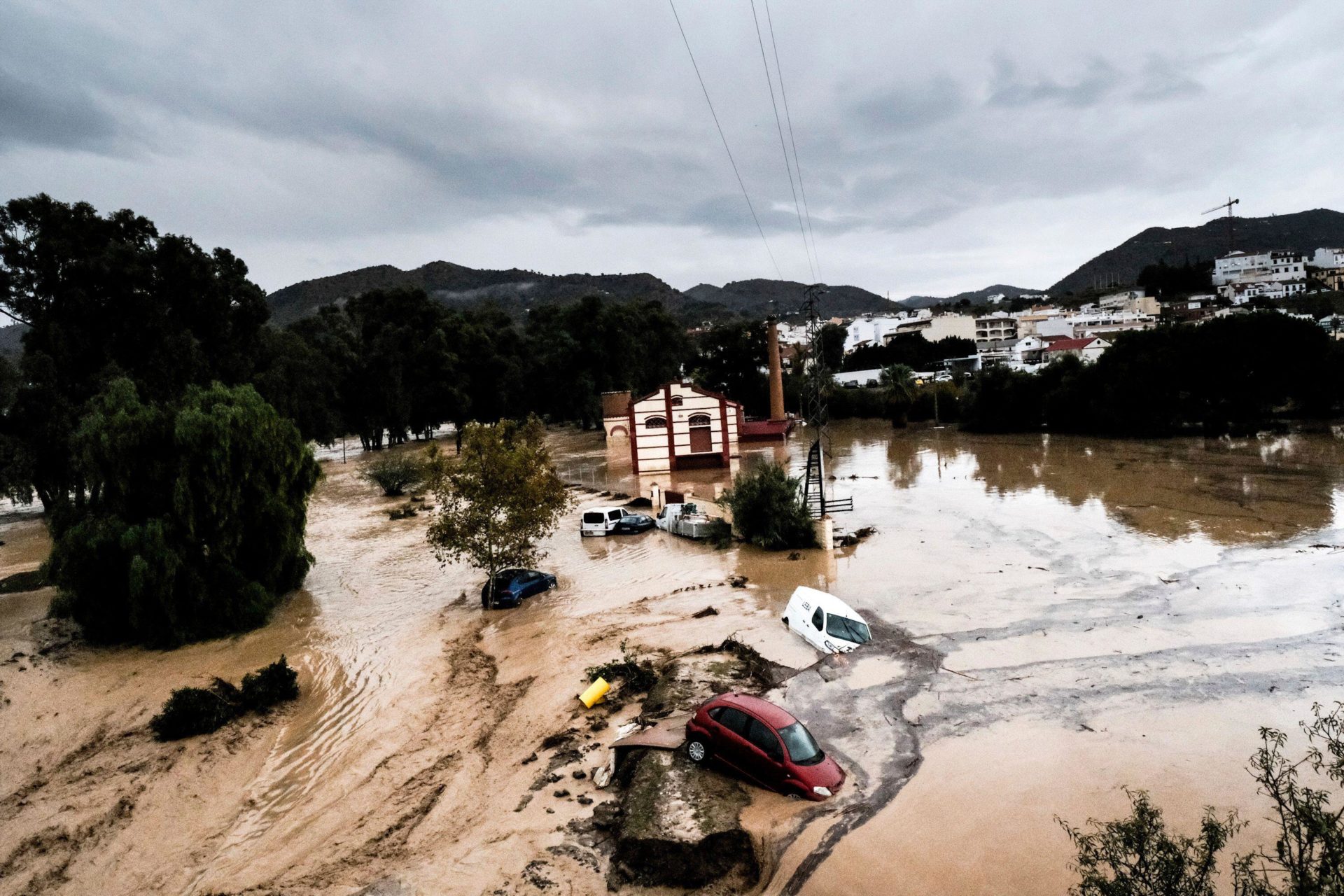 Cars are swept away by floods in the town of Alora, Malaga, Spain