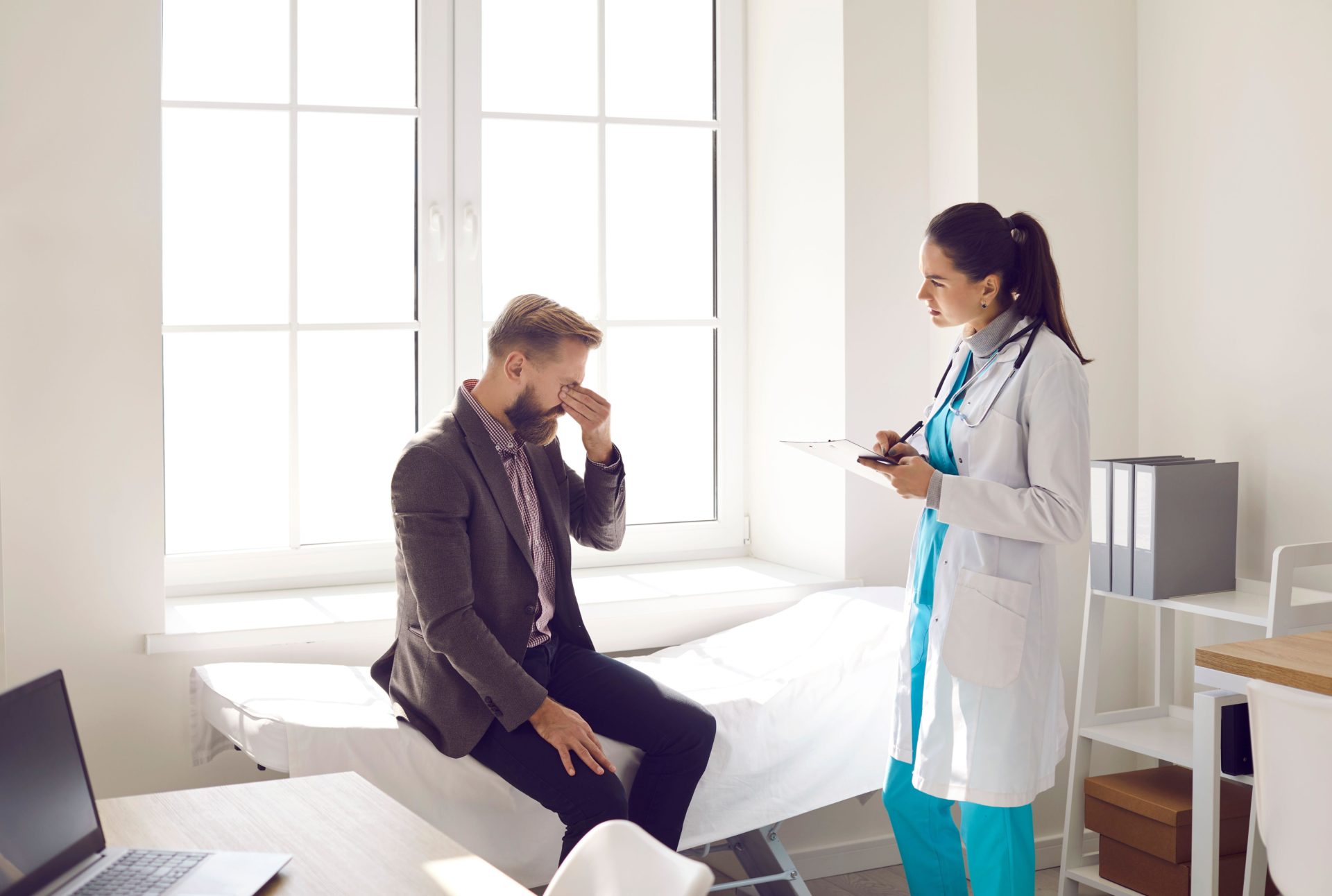 Patient suffering from stress, eye pain and migraine visiting doctor at hospital