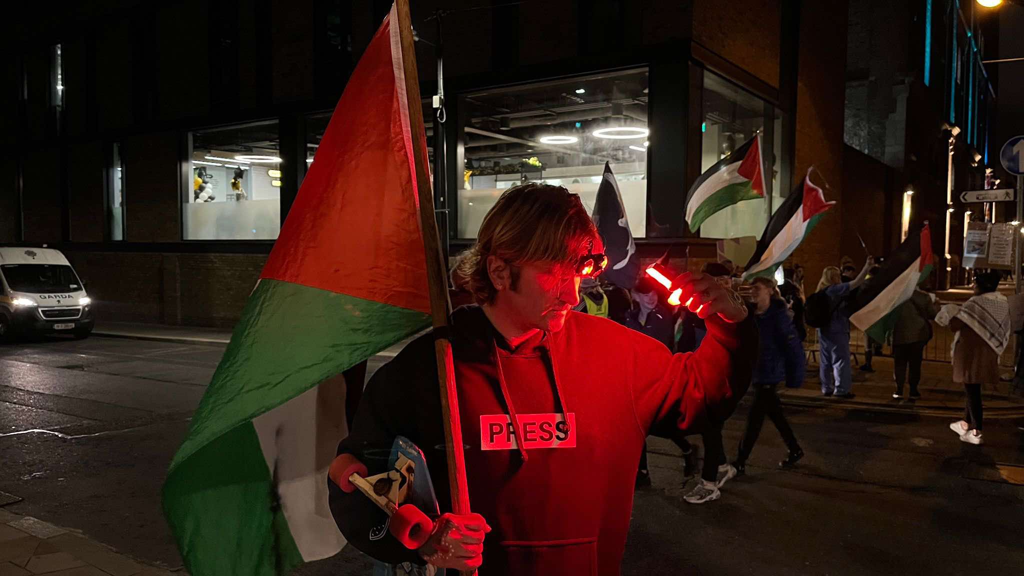 A protestor outside a US Embassy party. 