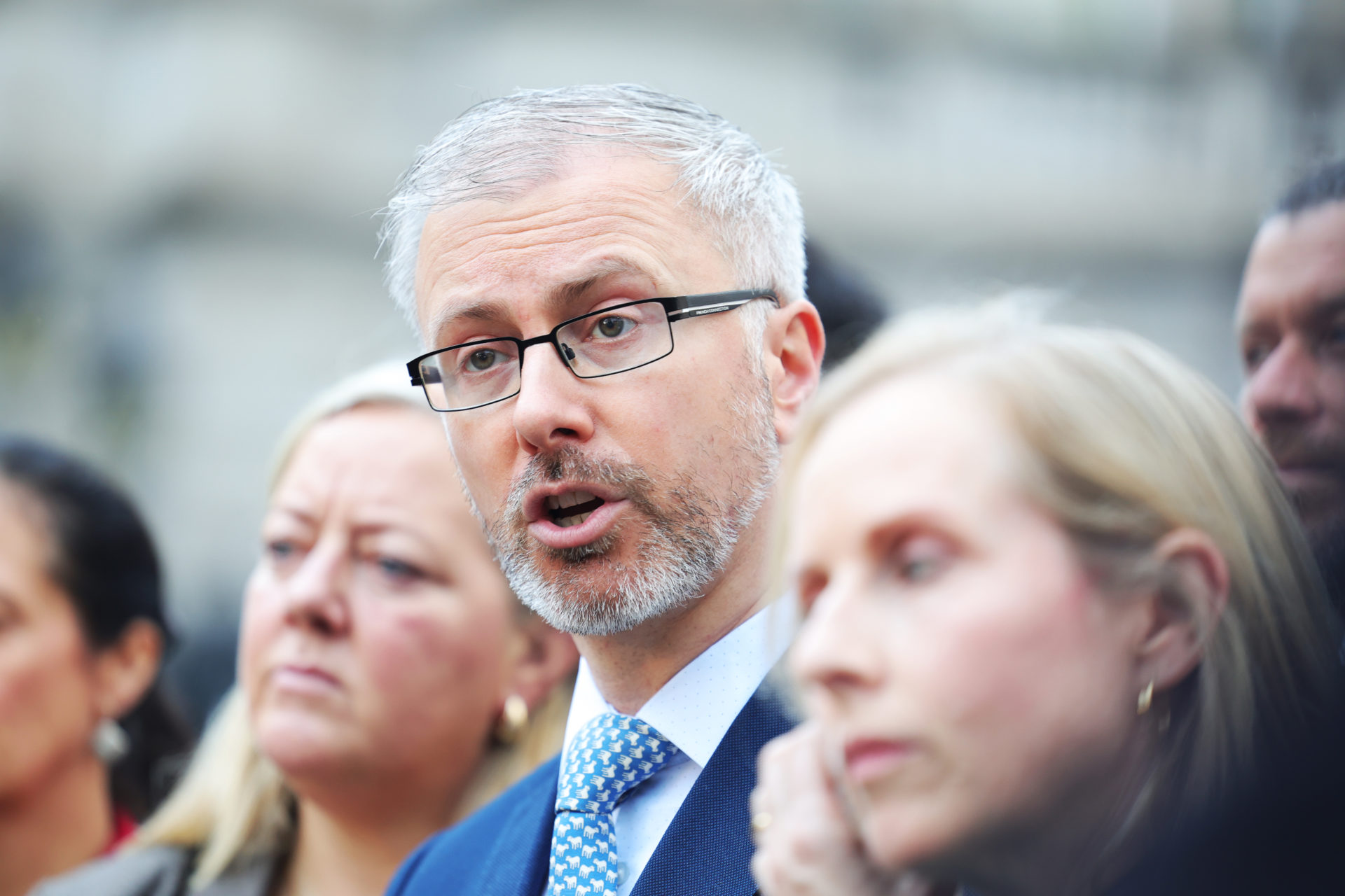 Green Party leader Roderic O'Gorman on the plinth at Leinster House