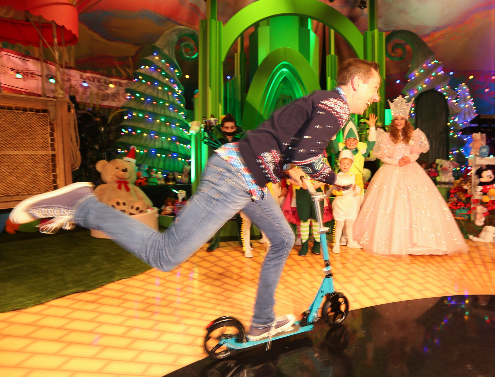 Ryan Tubridy zooming on a scooter on The Late Late Toy Show. 