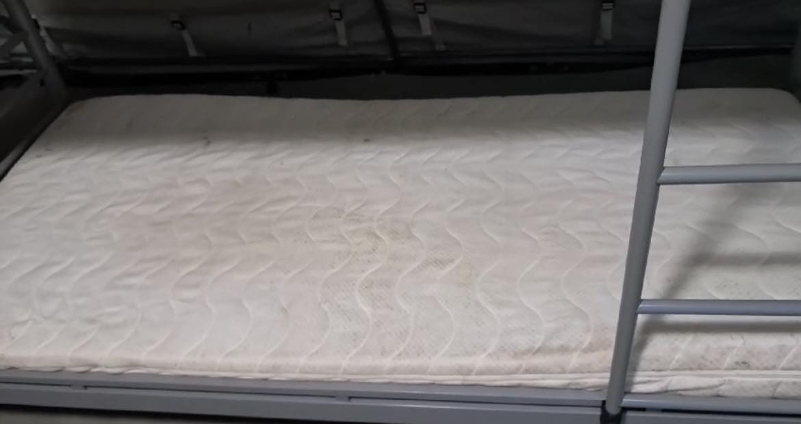 A bed in State accomodation for asylum seekers. 