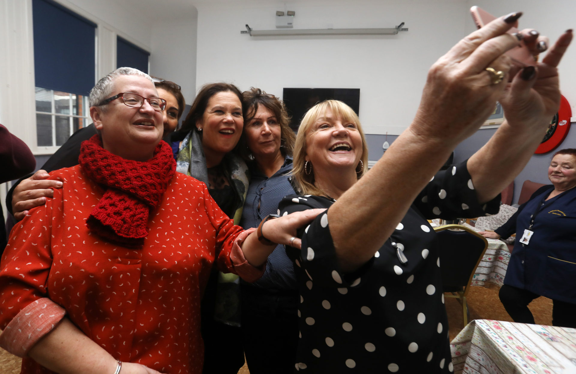 Mary Lou McDonald takes a selfie with members of the public