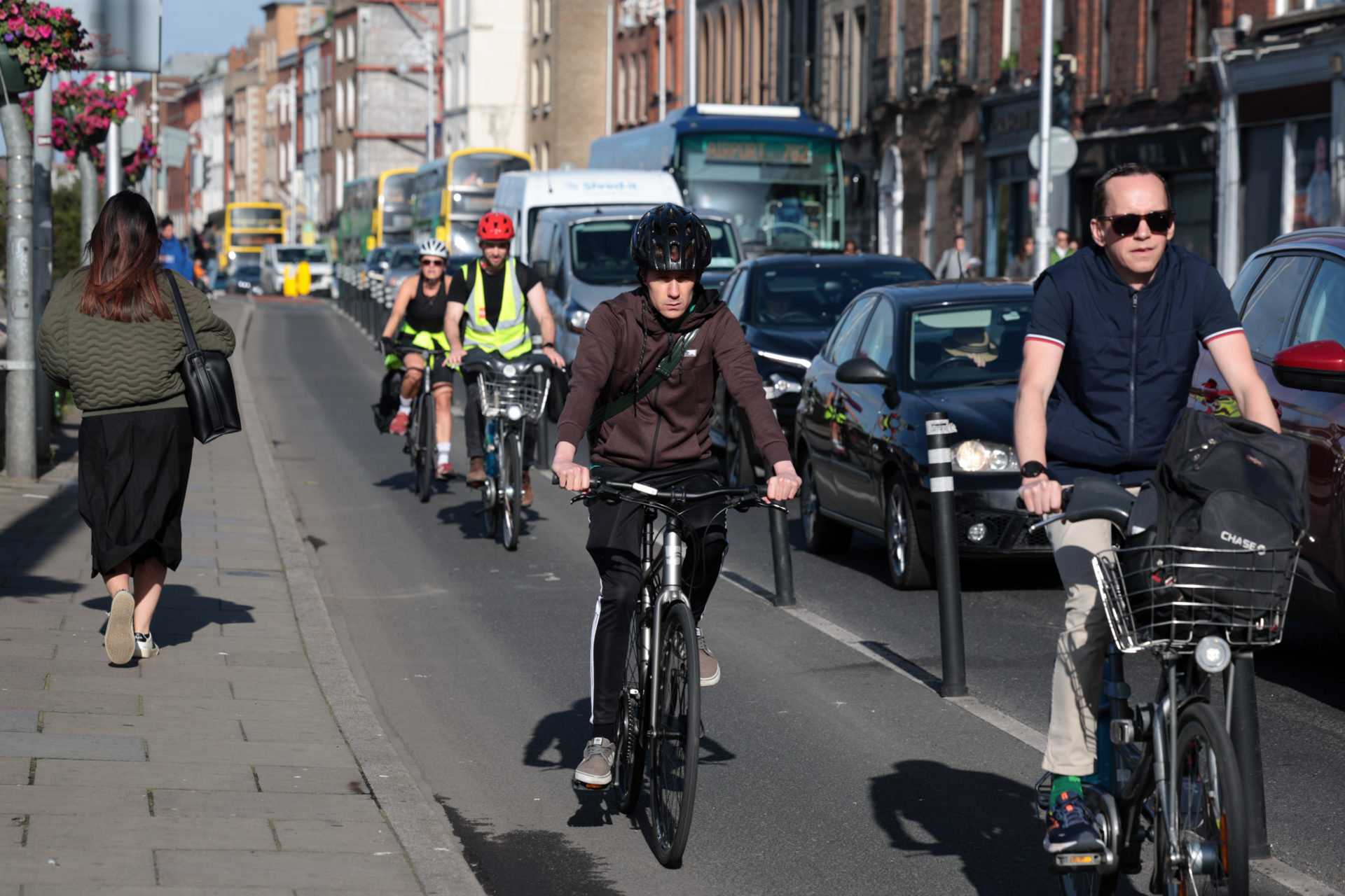 Cyclists and cars using Dublin City Roads