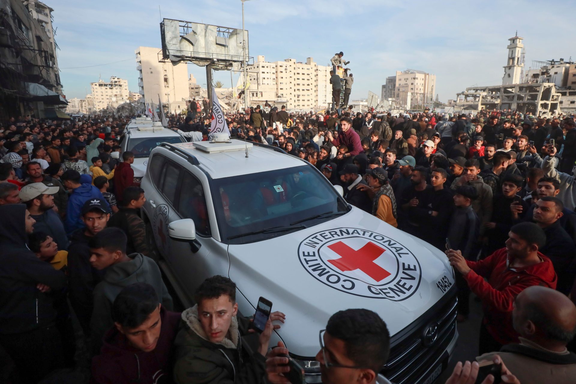 A Red Cross convoy arrives to collect Israeli hostages released after a ceasefire agreement between Israel and Hamas took effect, in Gaza City