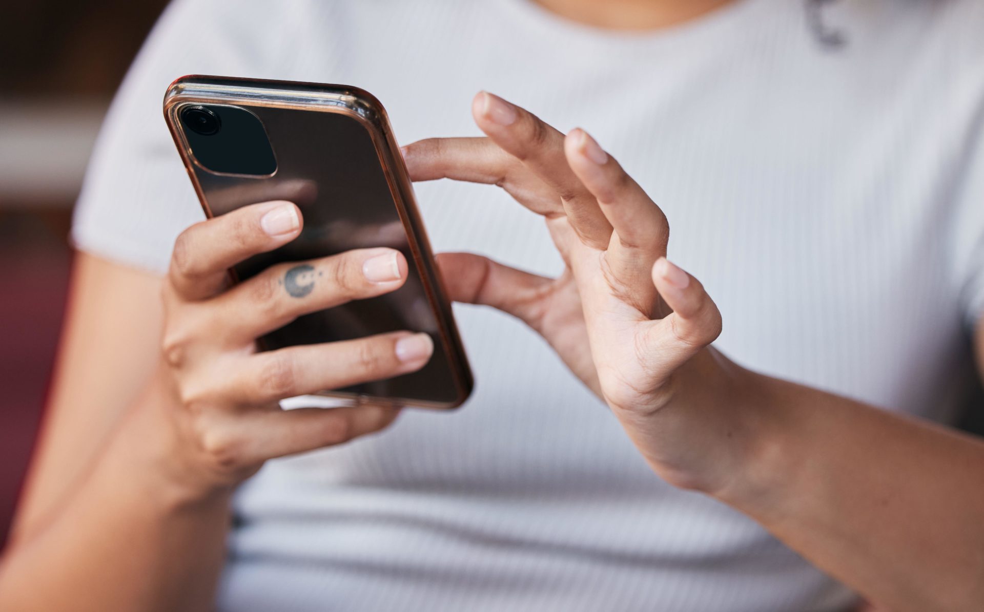 A person touching their phone