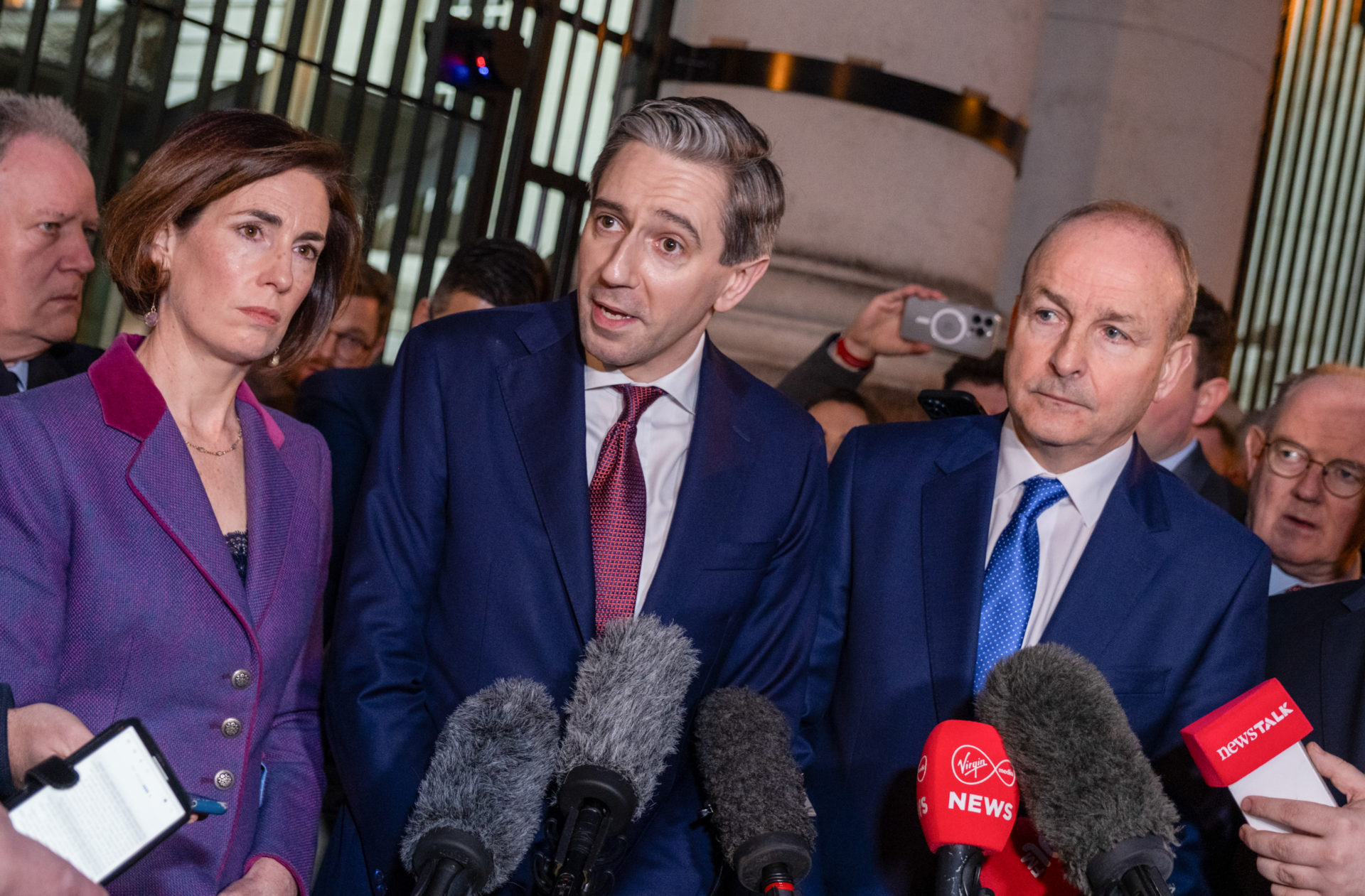 22/01/2025 Dublin, Ireland. Fianna Fail leader Micheal Martin and Fine Gael leader Simon Harris speak to media outside Government Buildings this evening, after the Dail was adjourned in chaos amidst controversy over speaking time. Photograph: Alan Rowlette / © RollingNews.ie