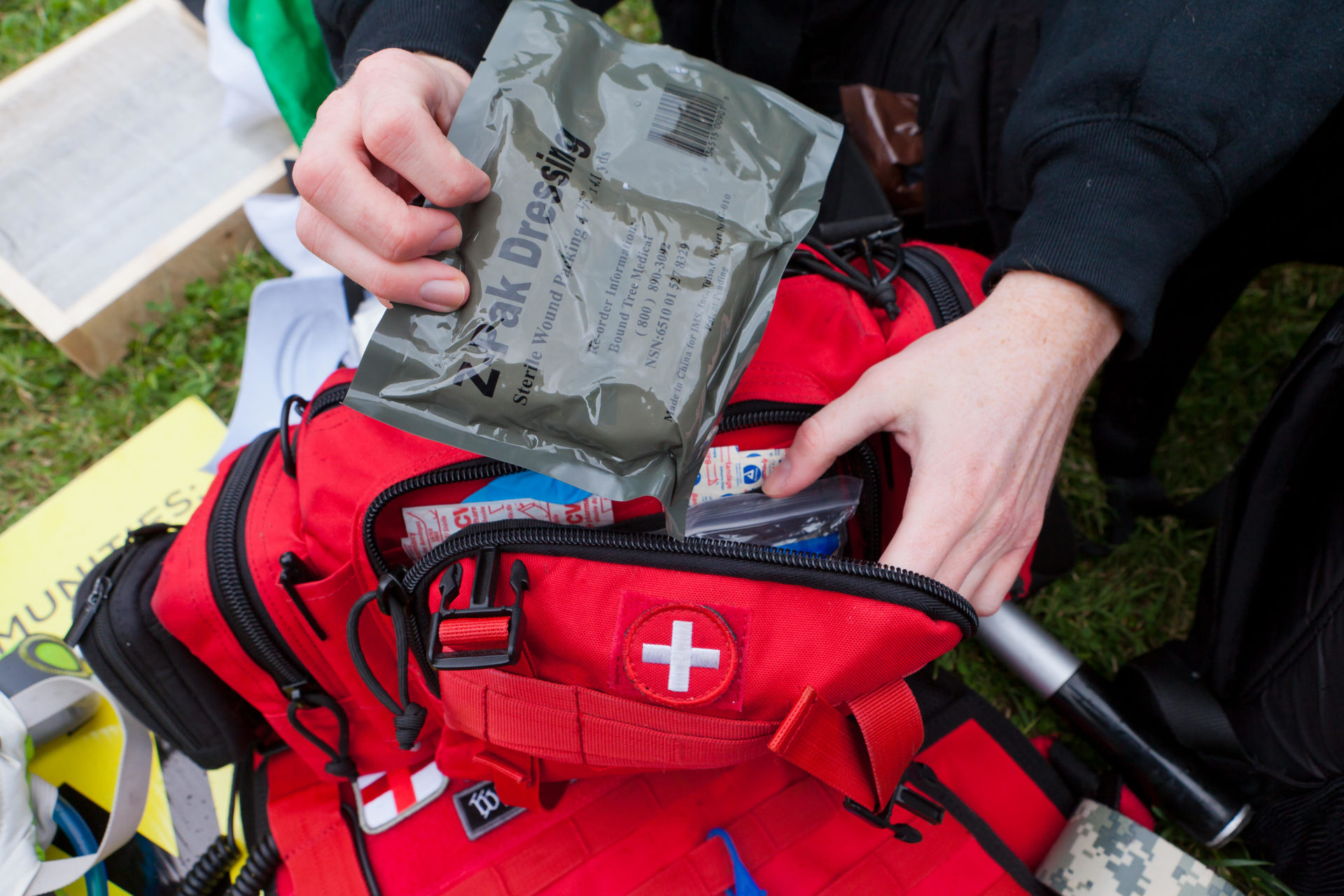 EMT personnel preparing first aid kit. Image: Alamy