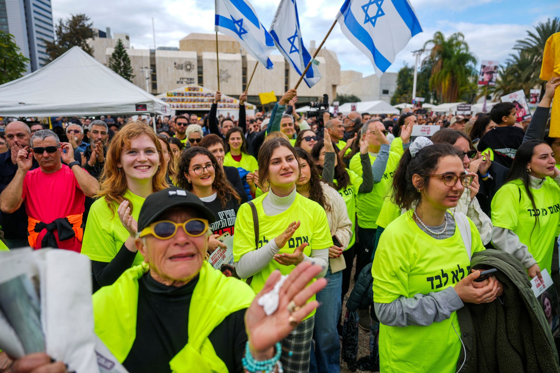 Relatives and friends of Israeli people killed and abducted by Hamas and taken into Gaza, react as they follows the news of the hostages' release, in Tel Aviv, Israel. 