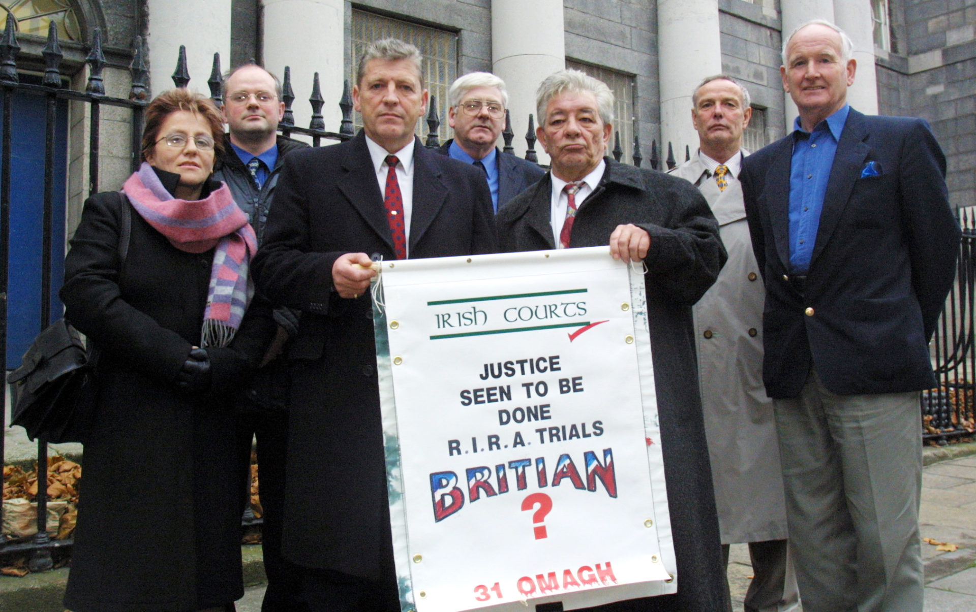 Stanley McCombe whose wife died due to the Omagh bombing and Chairman of the Omagh support and Self Help Group Michael Gallagher whose 21 year old son died in the Omagh bombing withMembers of the Omagh Support and Self Help Group outside the Special Criminal Court, Dublin during the Colm Murphy Case. Colm Murphy is the only person charged with the 1998 Omagh bombing. 16/11/2001. Photo: RollingNews.ie